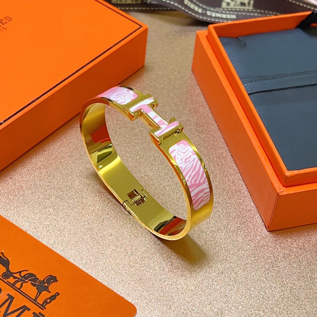Bracelet Hermes Clic H Zebra Pattern métal doré et émail imprimé zèbre rose et blanc 17cm