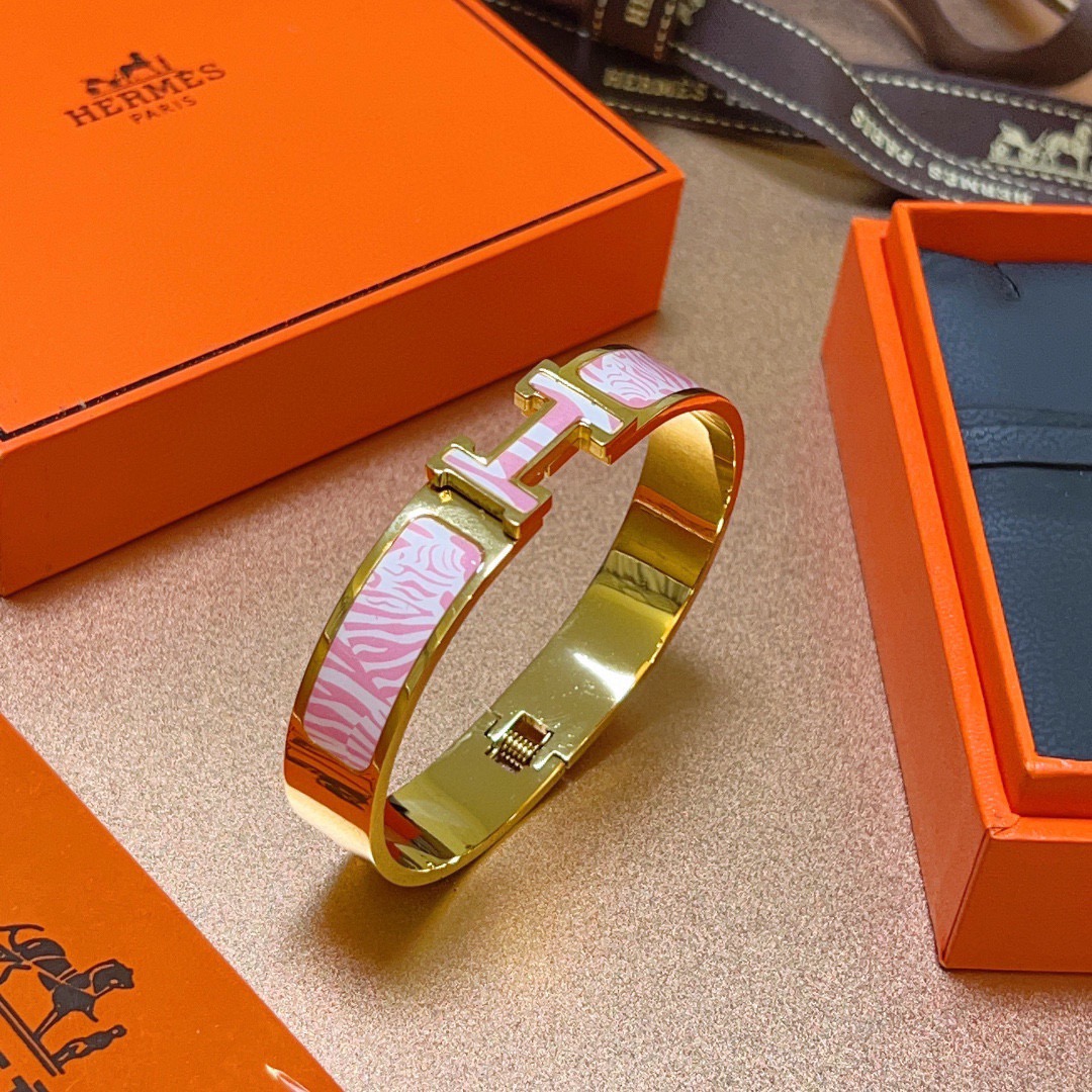 Bracelet Hermes Clic H Zebra Pattern métal doré et émail imprimé zèbre rose et blanc 17cm