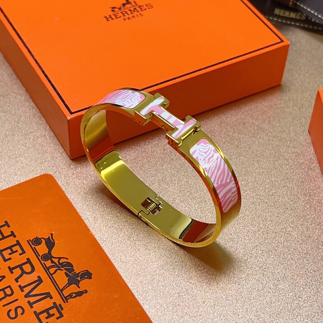 Bracelet Hermes Clic H Zebra Pattern métal doré et émail imprimé zèbre rose et blanc 17cm