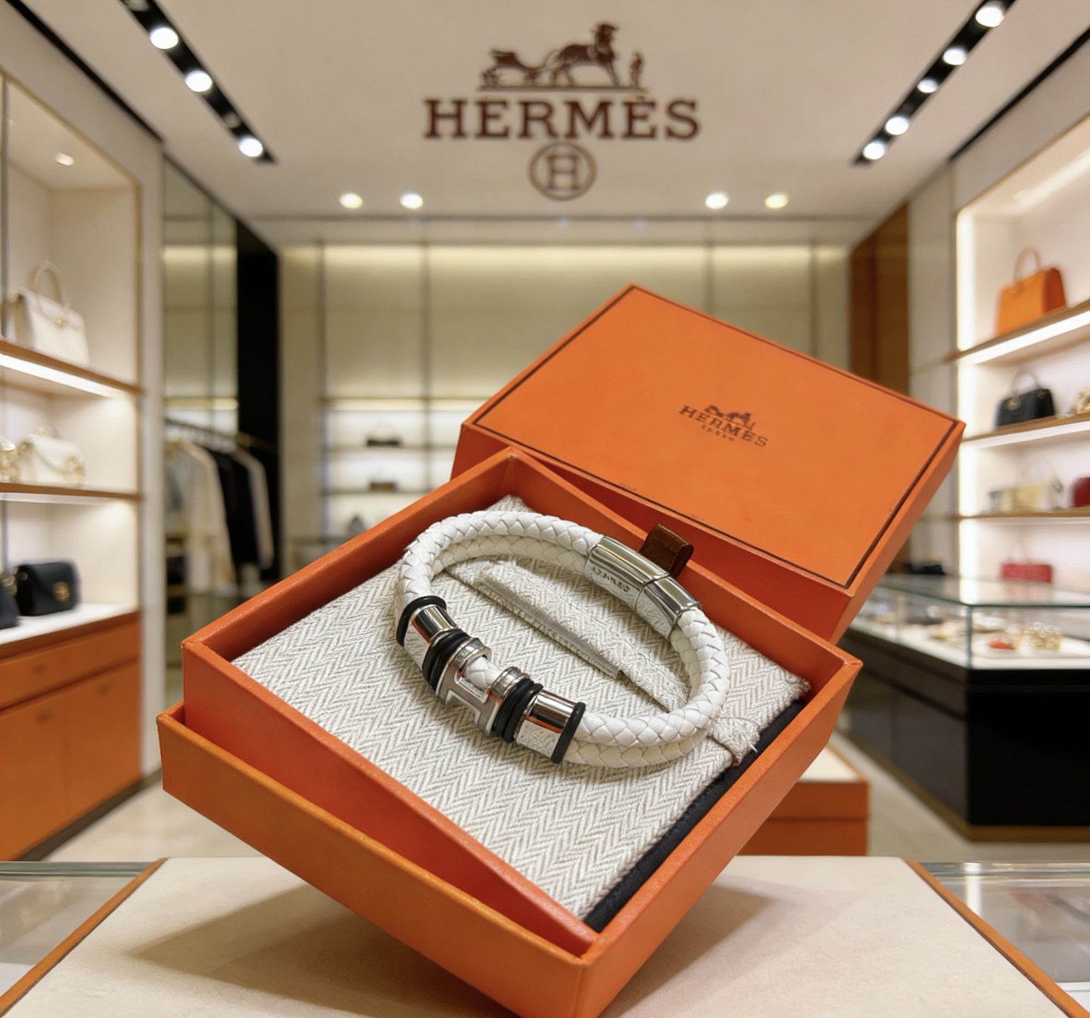 Hermes New Anger Forest bracelet white braided leather palladium-plated metal black rubber accents 19cm
