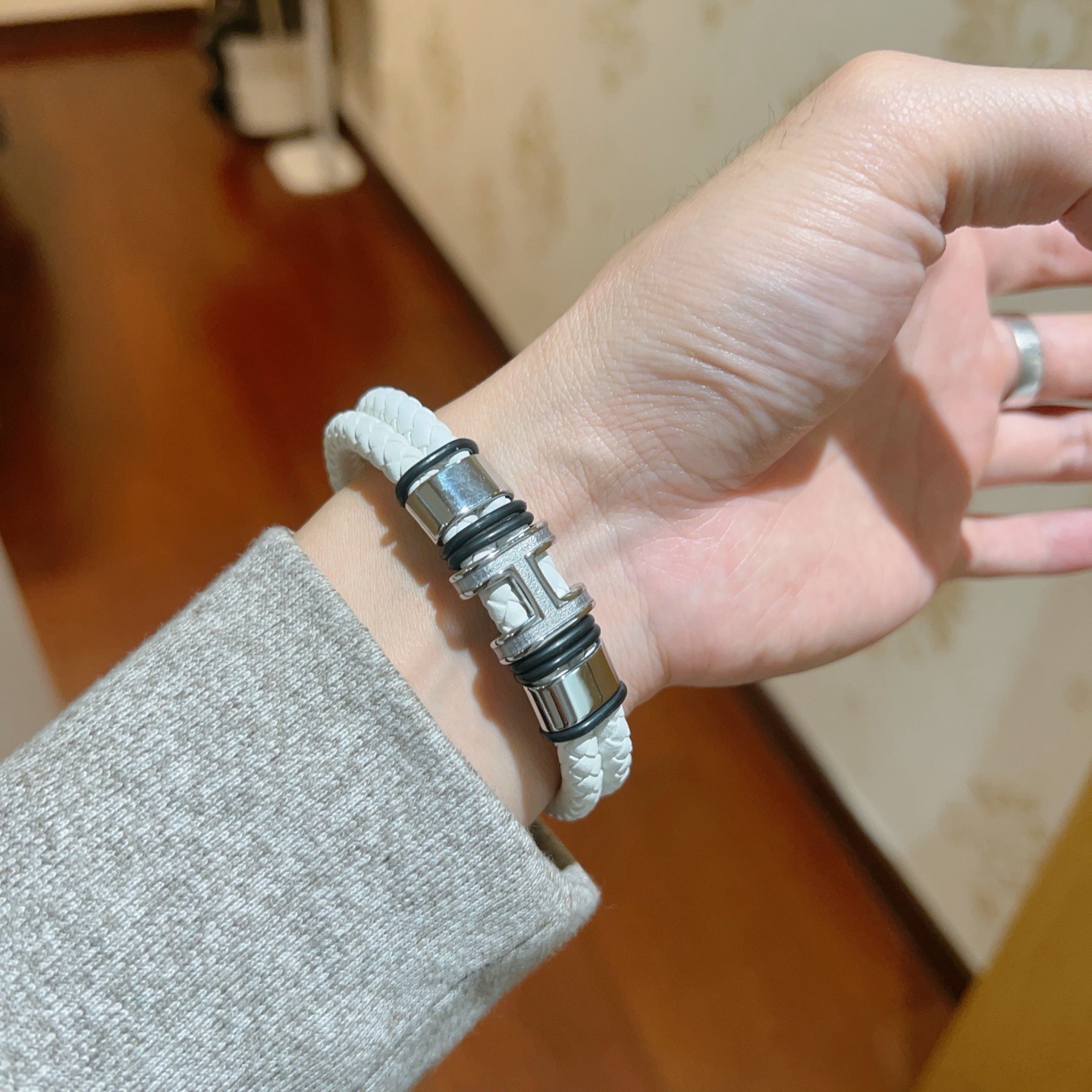 Hermes New Anger Forest bracelet white braided leather palladium-plated metal black rubber accents 19cm