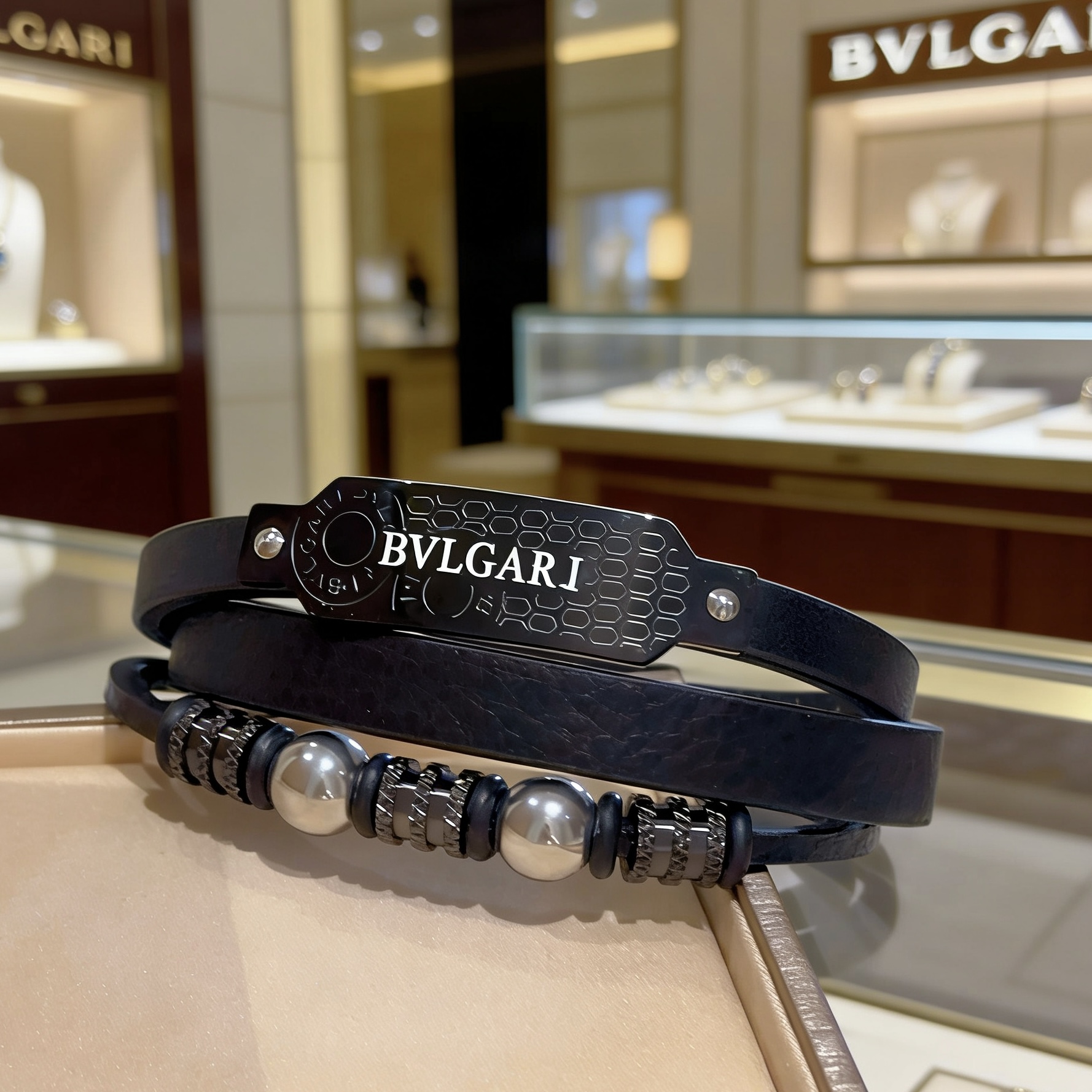 Bvlgari Serpenti Forever Coiled Leather Bracelet bracelet Black leather with gunmetal black metal hardware and silver-toned spherical accents 19cm