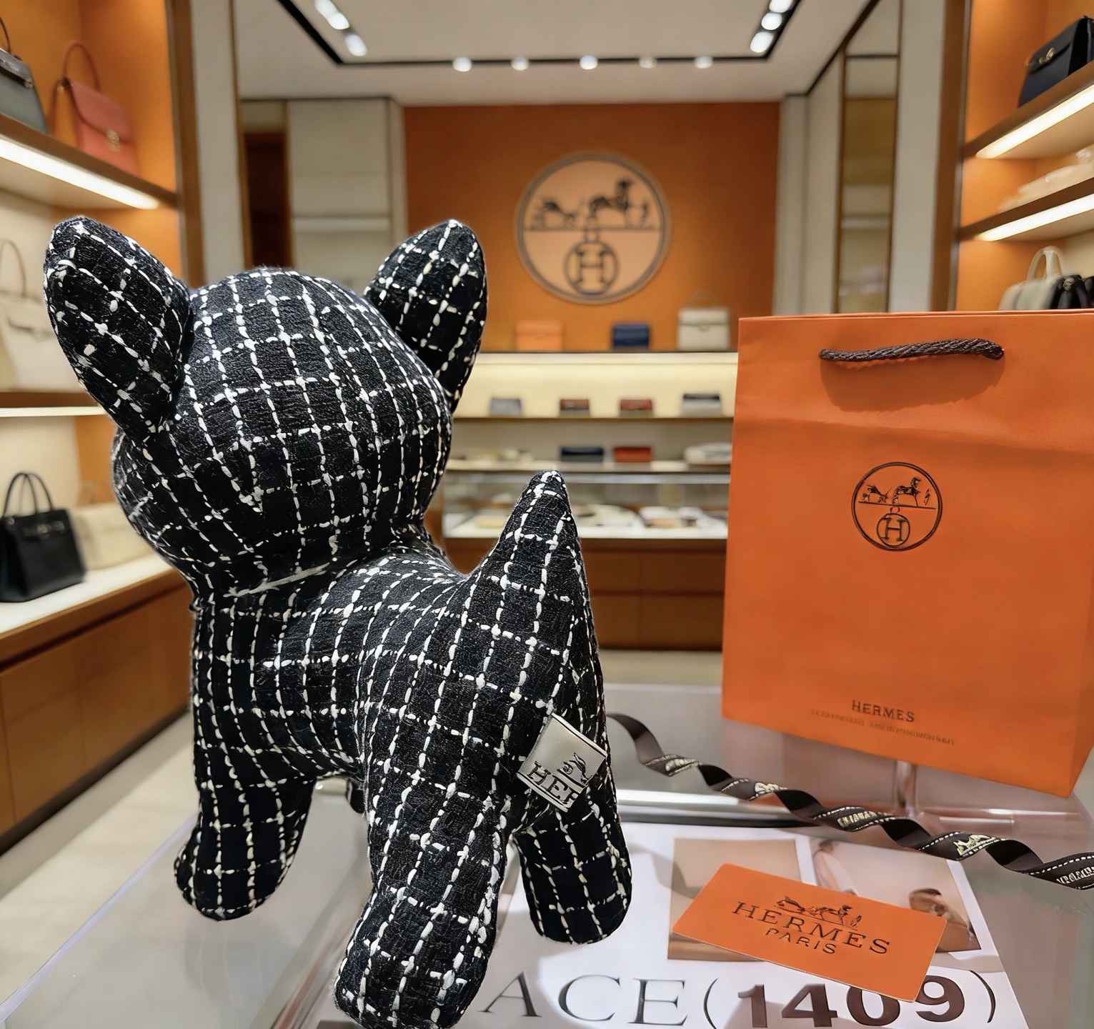 Hermes Buldog Plush Decor brooch Black fabric with white grid pattern brown eyes black nose 28cm