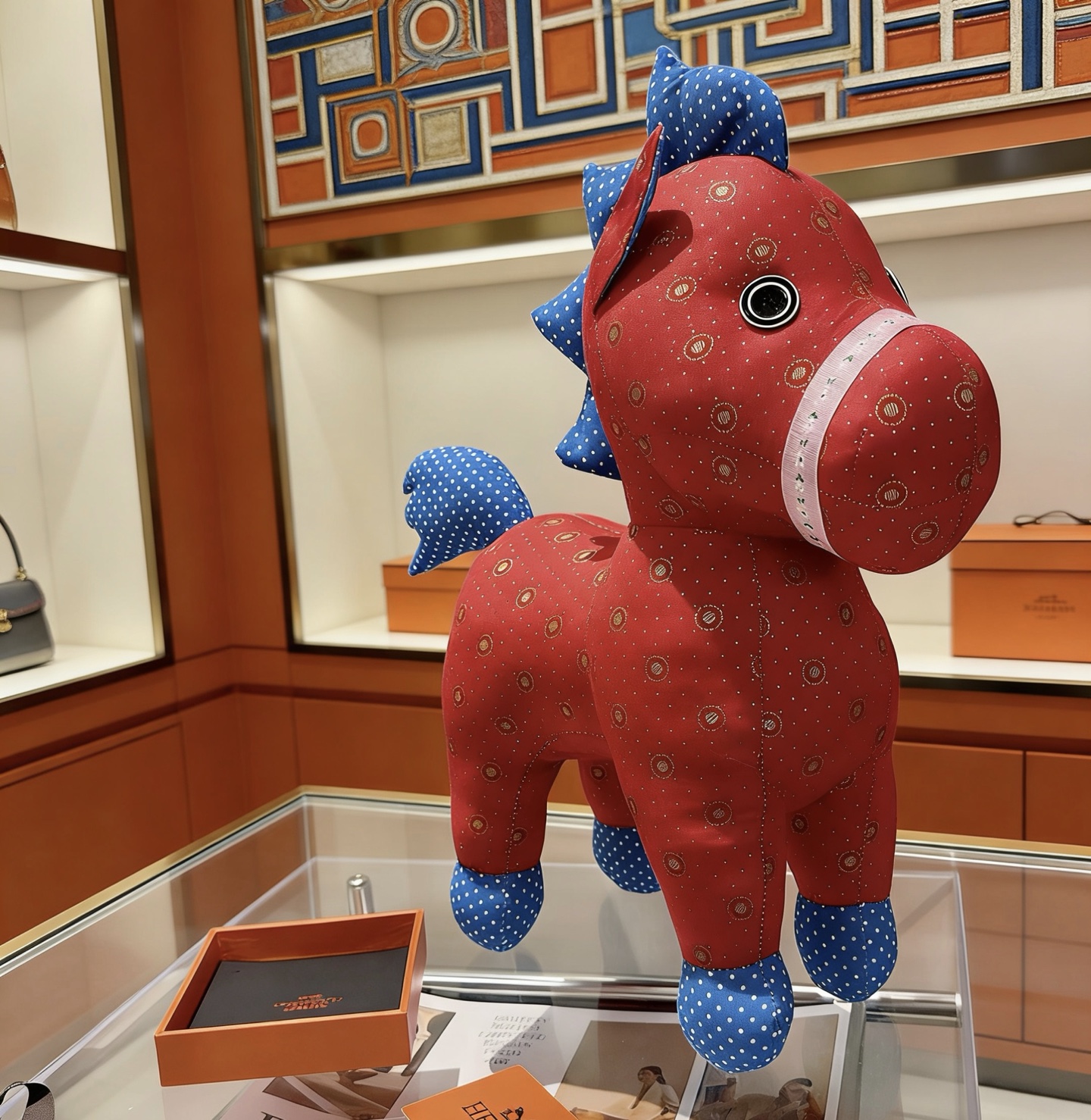 Hermes Hermy Plush Horse brooch Red fabric body with blue polka-dot fabric accents white decorative trim black eye details 35cm