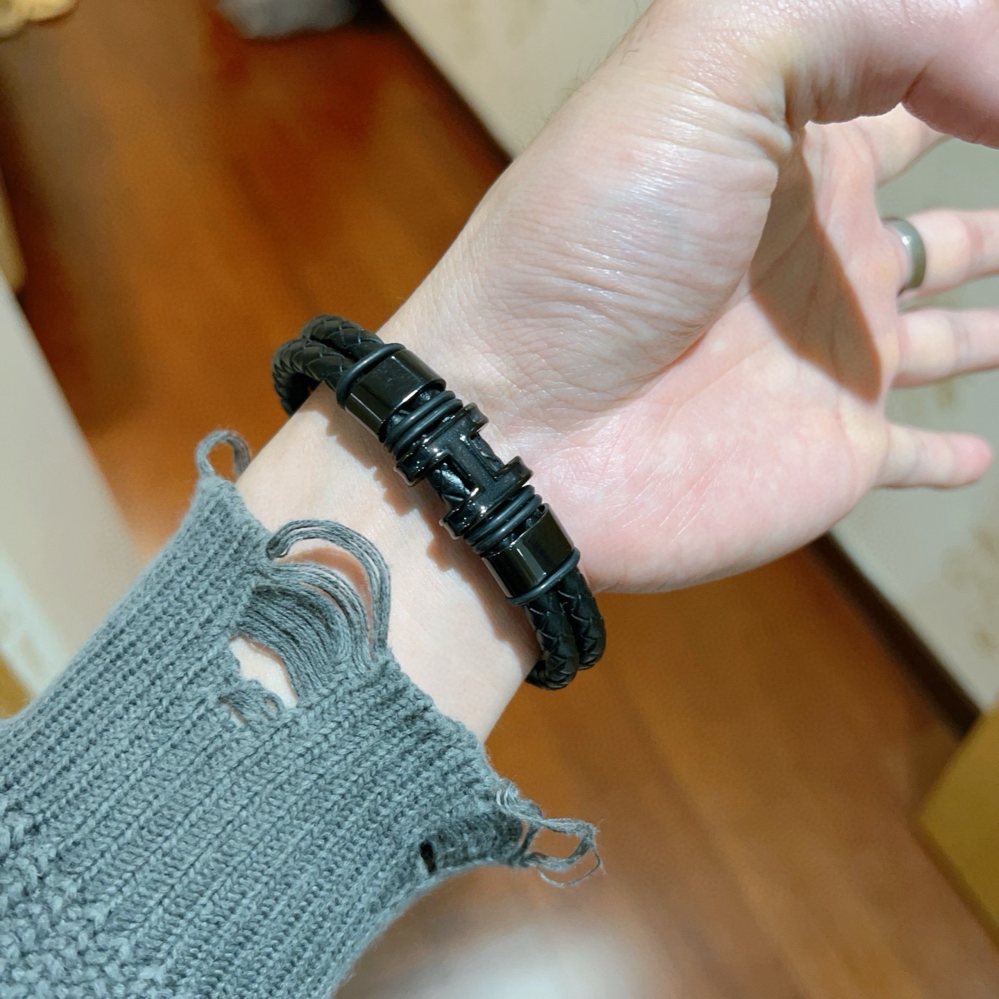 Bracciale Hermes New Anger Forest Pelle intrecciata nera con hardware nero color canna di fucile 19 cm