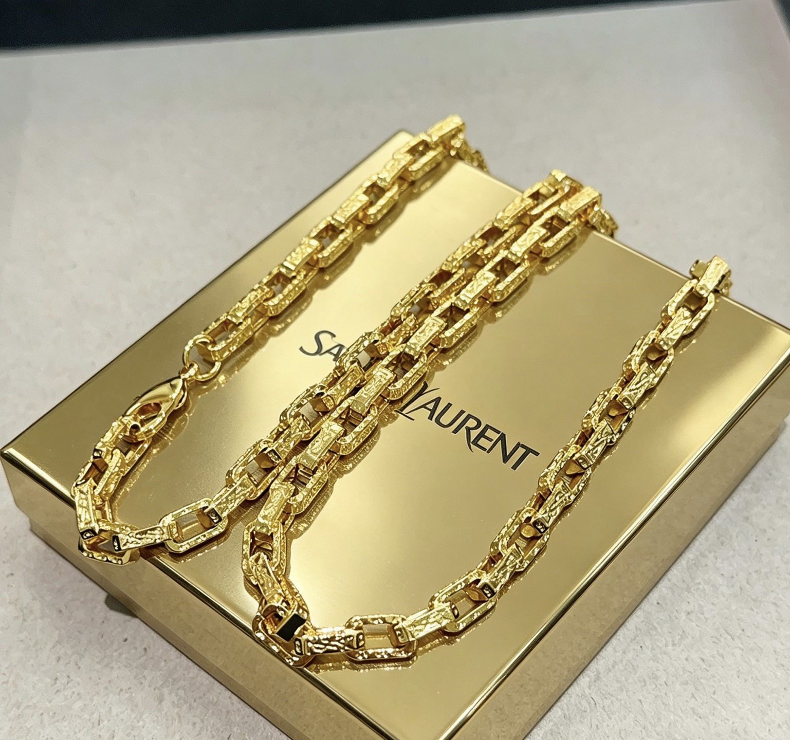 Saint Laurent Textured Chain Link necklace gold-tone metal with black enamel accents 60cm