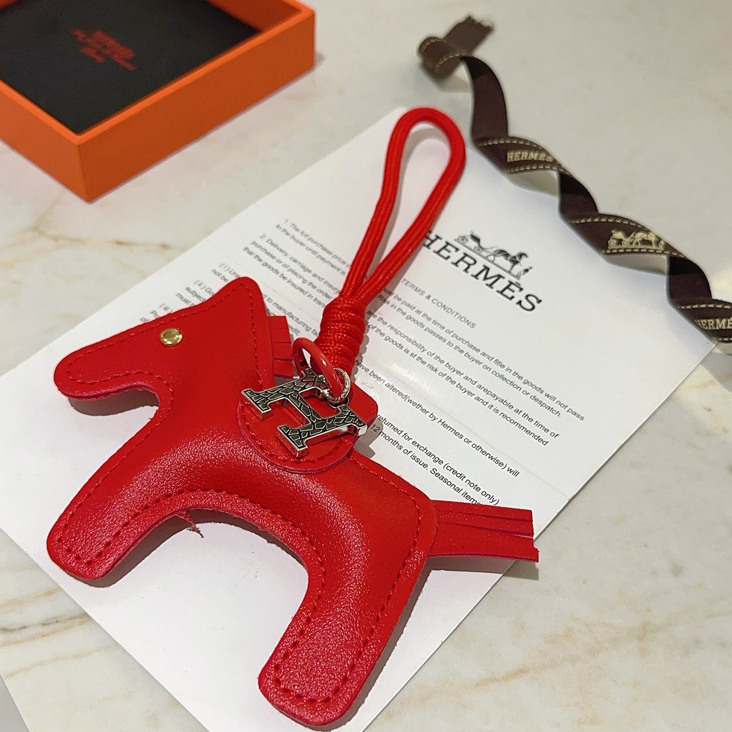 Hermes Rodeo Horse Bag Charm pingente Couro vermelho com ferragens de metal prateado 10 cm