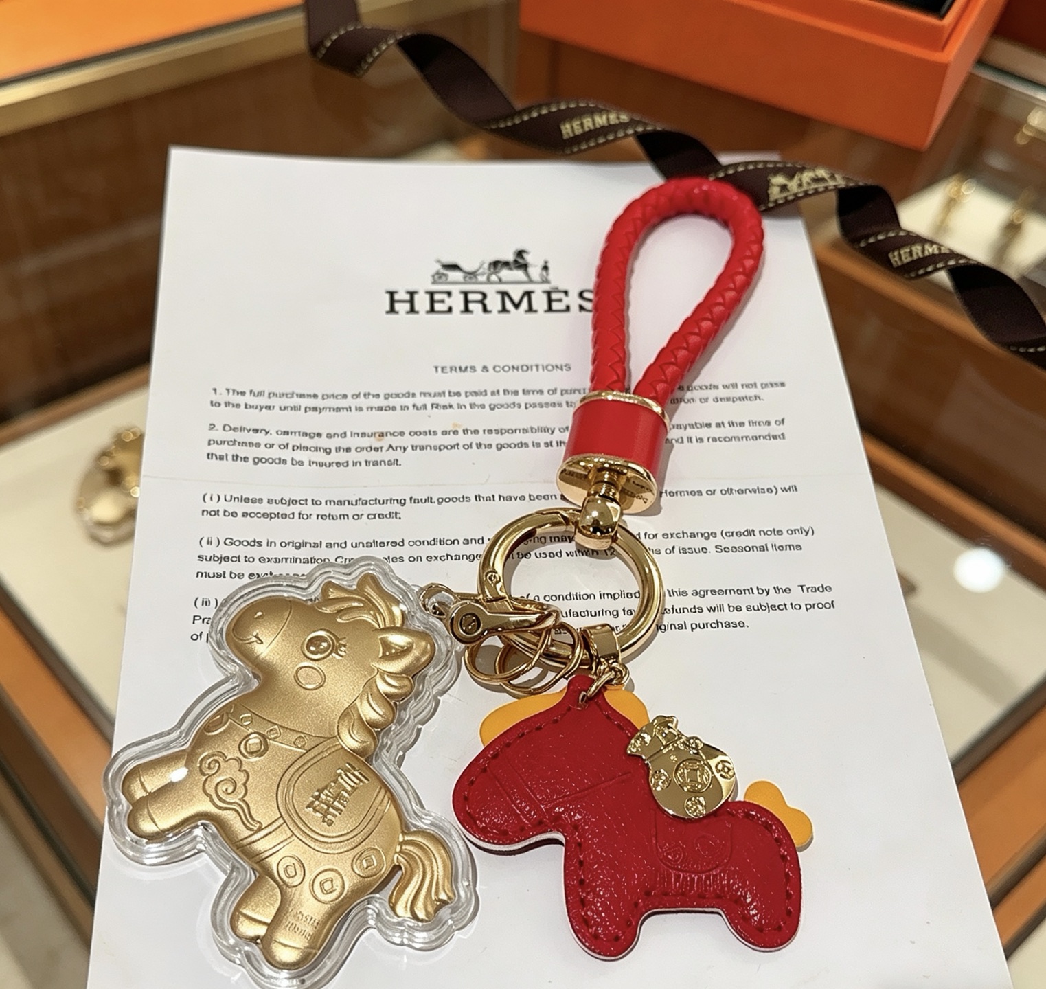 Hermes Lucky Horse Charm pendant Red leather gold-tone metal clear protective casing 10cm total length