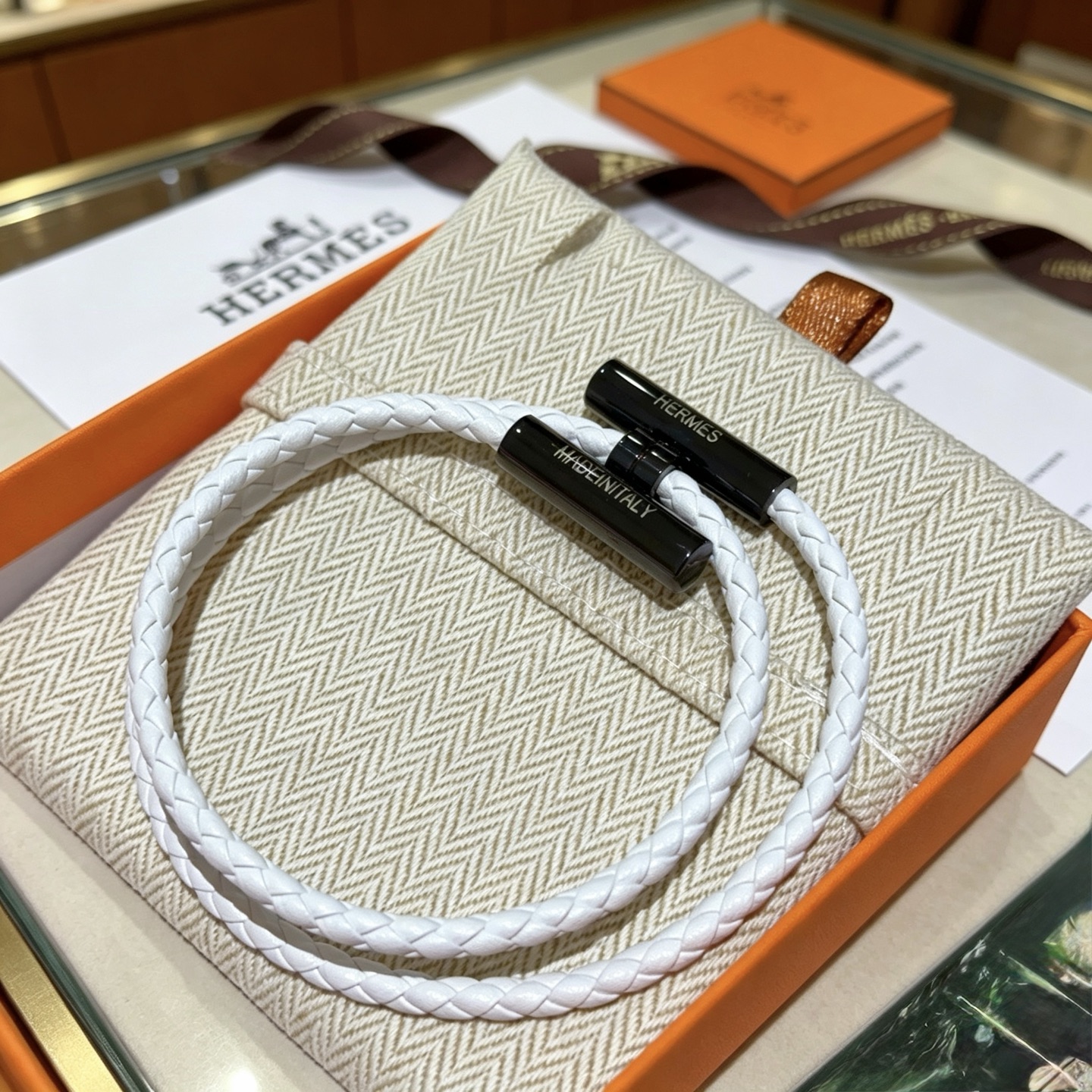 Hermes Tournis Tresse bracelet white braided leather with black hardware 19cm