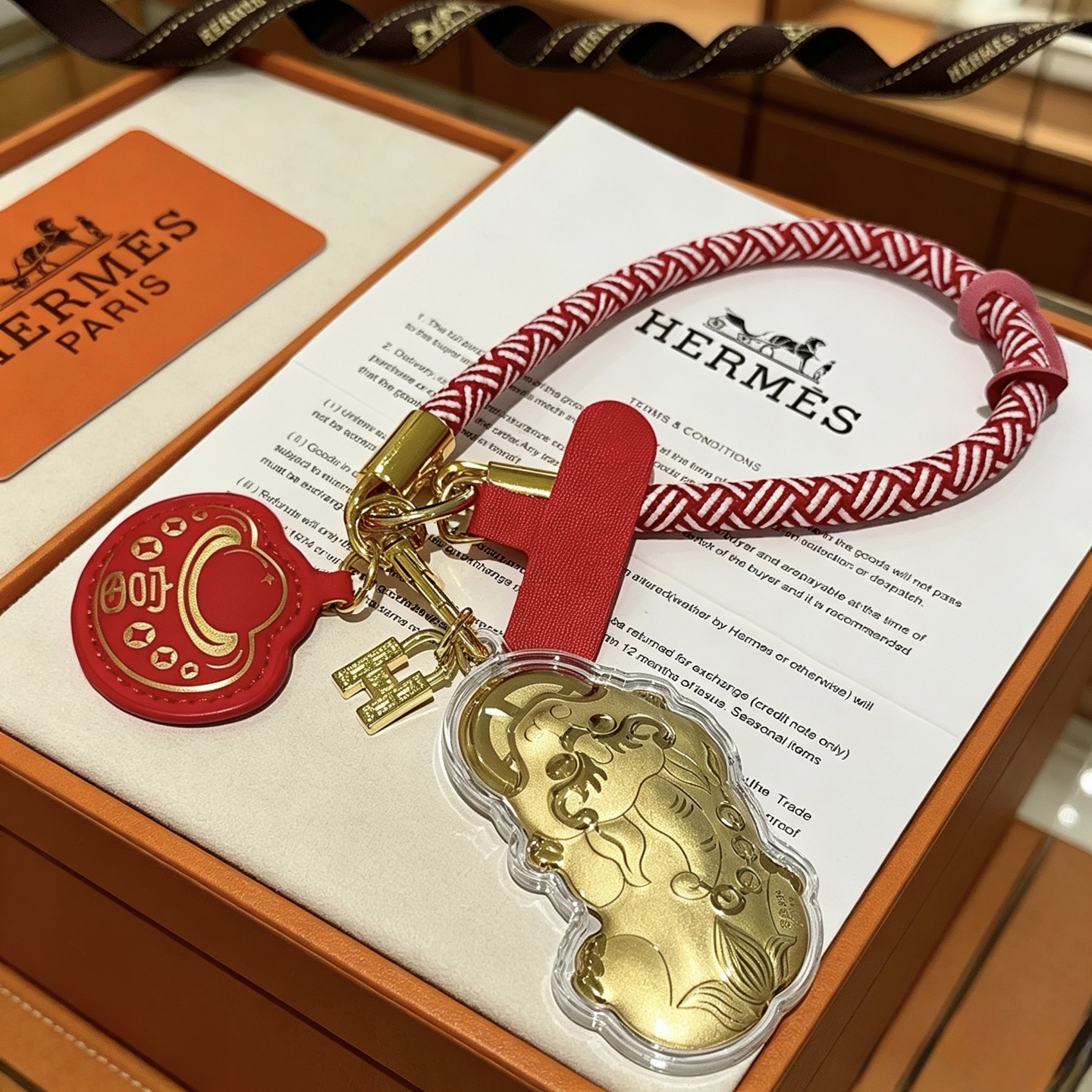 Hermes Lunar New Year Pixiu Key Charm pendant Gold-tone metal red and white braided cord red leather 15cm loop length