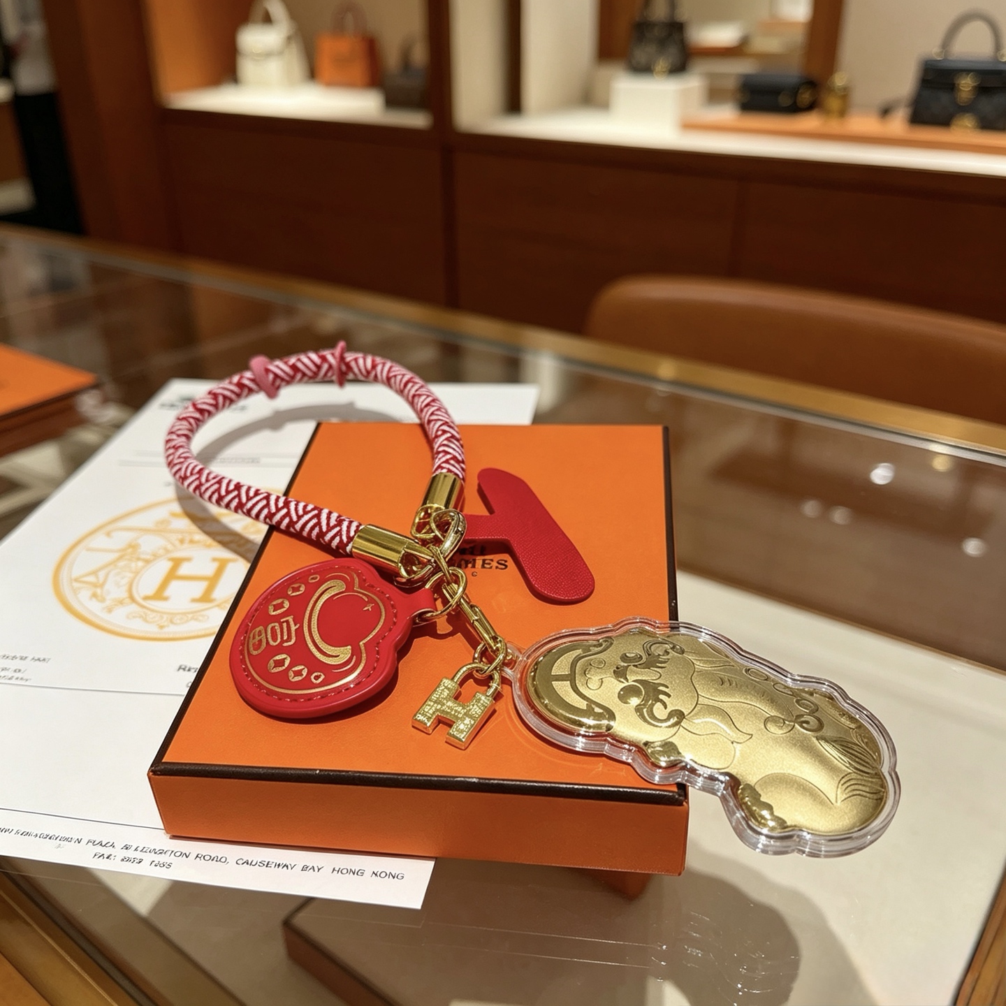 Hermes Lunar New Year Pixiu Key Charm pendant Gold-tone metal red and white braided cord red leather 15cm loop length