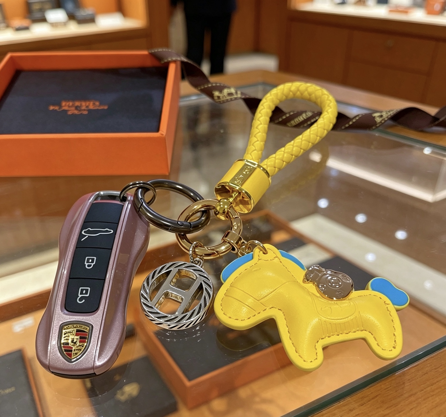 Hermes Rodeo Braided Key Charm pendant Yellow leather with blue accents gold-tone and silver-tone metal hardware 12cm total length