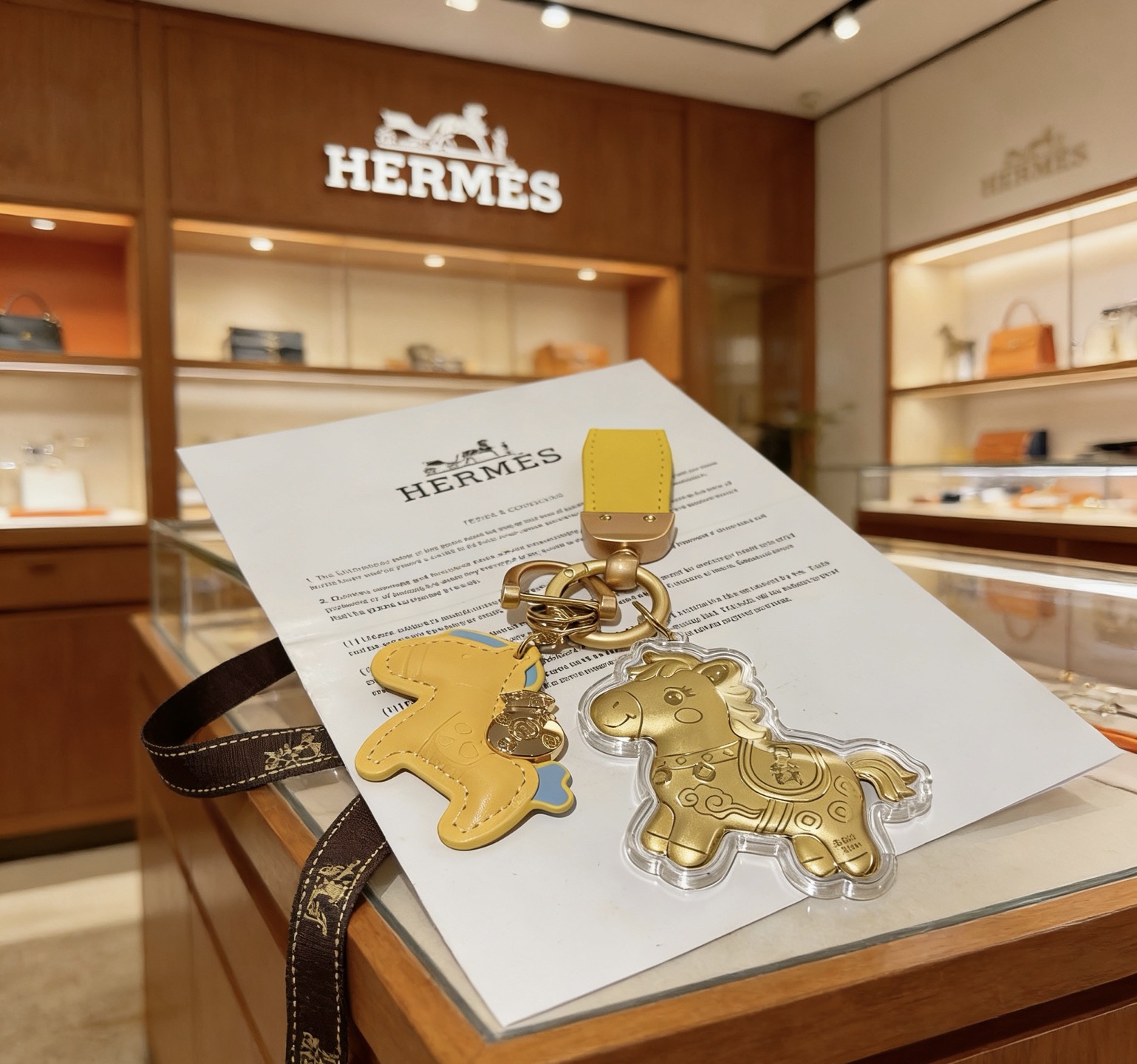 Hermes Rodeo Horse Charm Keychain pendant Yellow leather gold-tone metal light blue leather accents 12cm total length