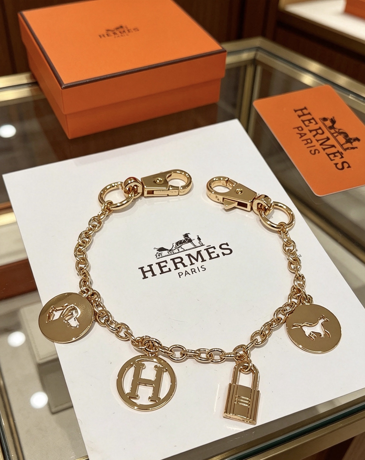 Bracelet Hermes Olga Charm Chain métal doré 18cm