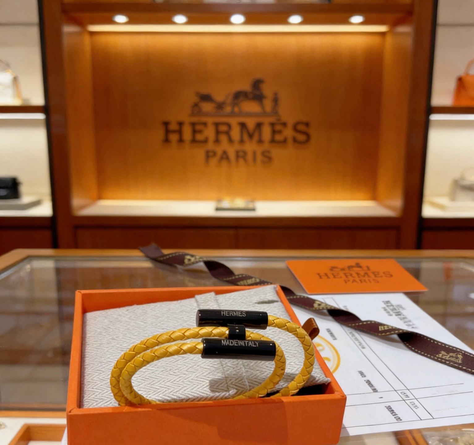 Hermes Tournis Tresse bracelet yellow braided leather black metal hardware 19cm