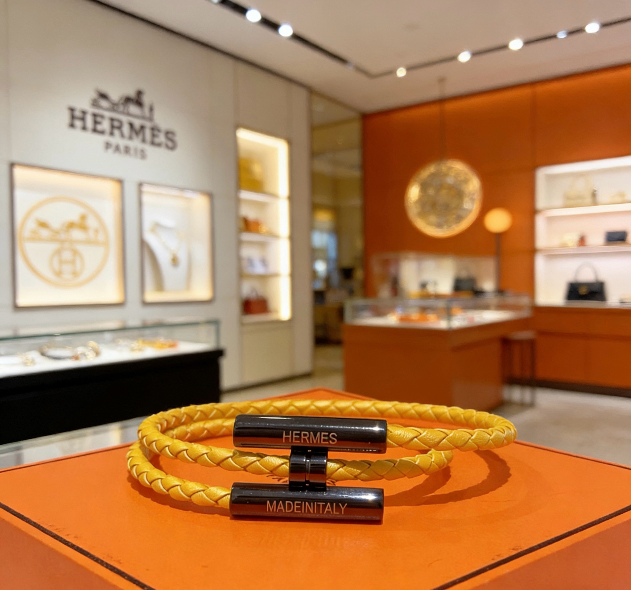 Hermes Tournis Tresse bracelet yellow braided leather black metal hardware 19cm