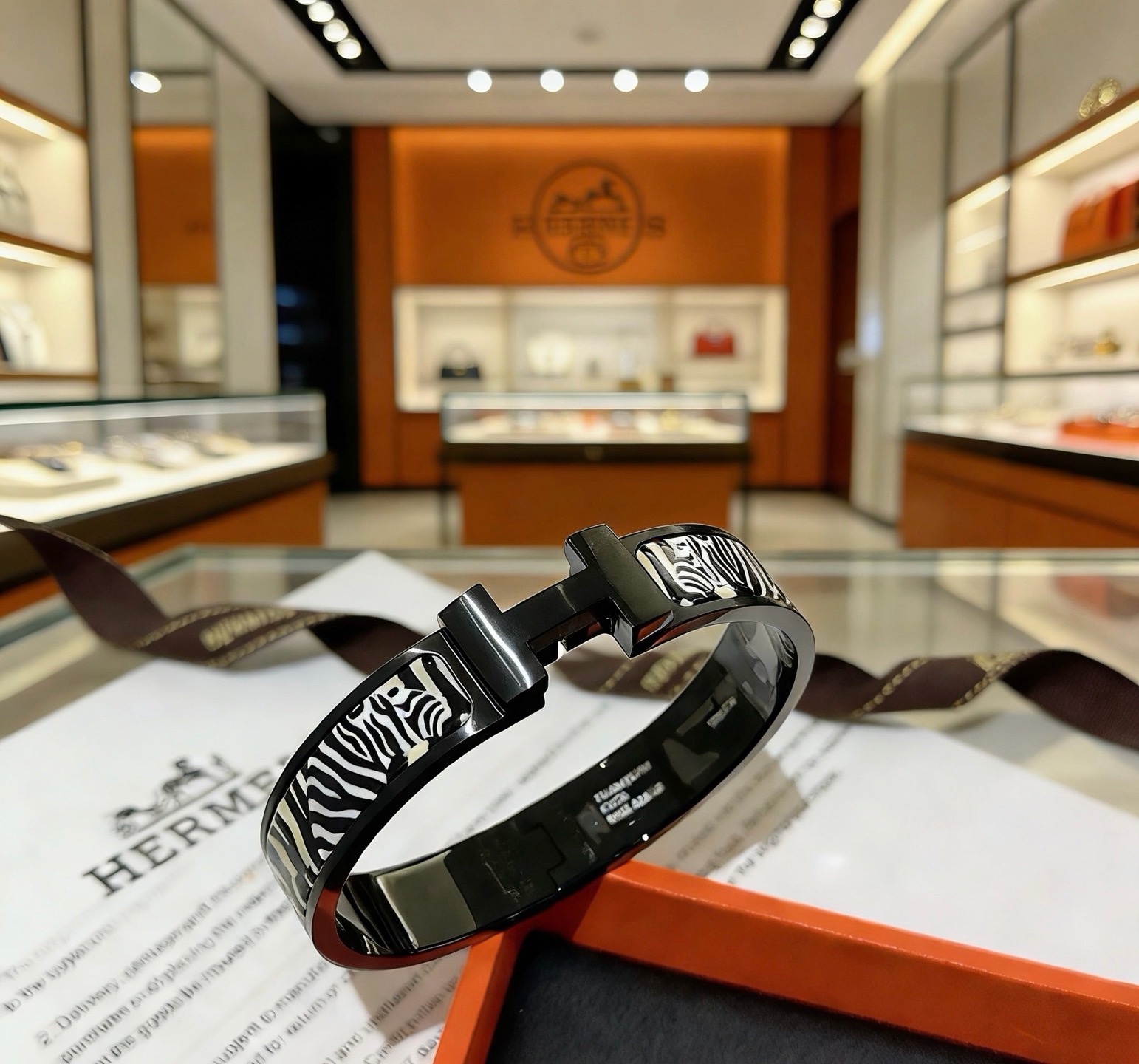 Hermes Clic Clac H Zebra bracelet black metal with black and white zebra pattern enamel 17