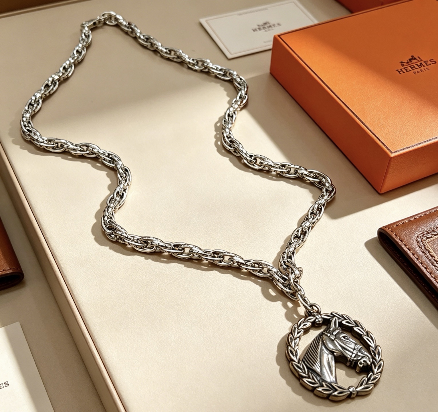 Hermès H pendant necklace, shown in the complete original source image set.
