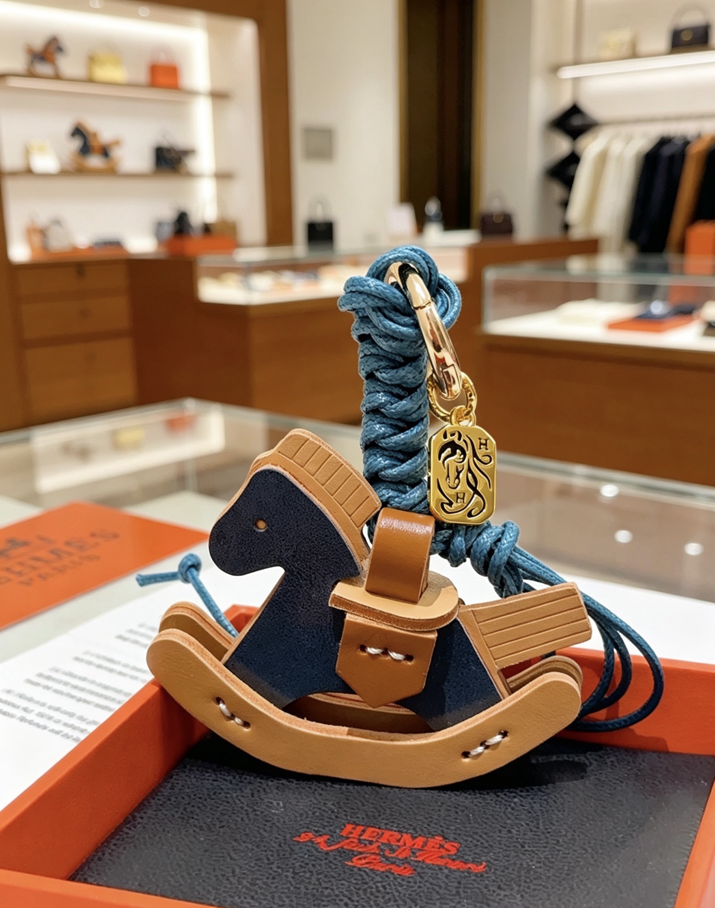 Hermes Rocking Horse Bag Charm pendant Gold-tone metal deep blue braided cord deep blue tan and light beige leather 12cm total length