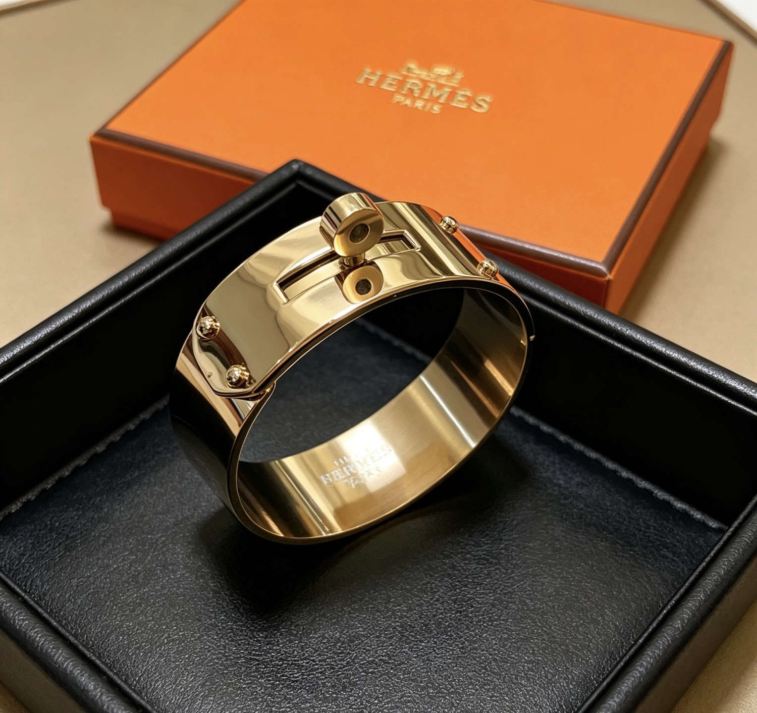Bracciale Hermes Kelly in metallo color oro 21 mm