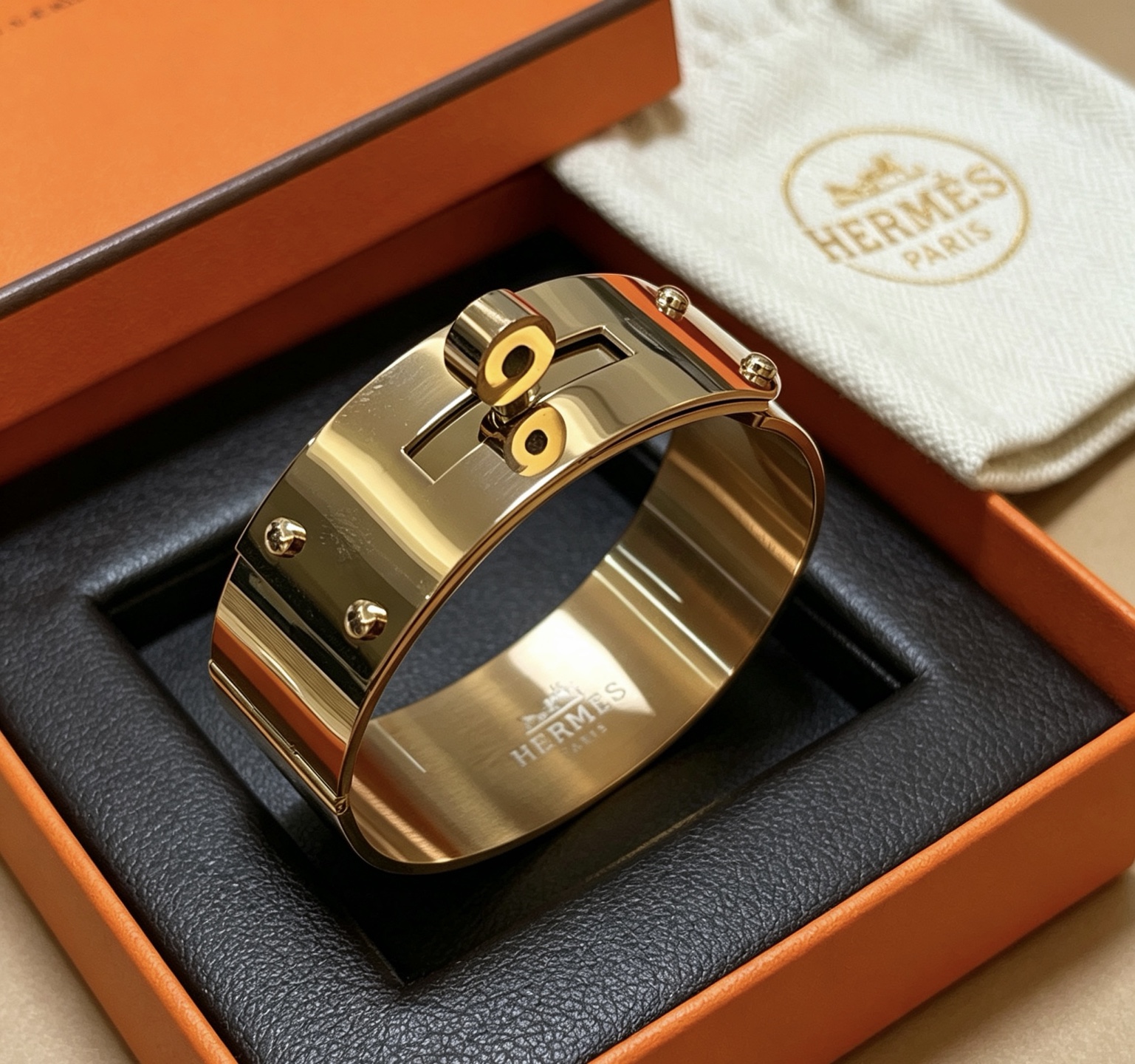 Bracciale Hermes Kelly in metallo color oro 21 mm