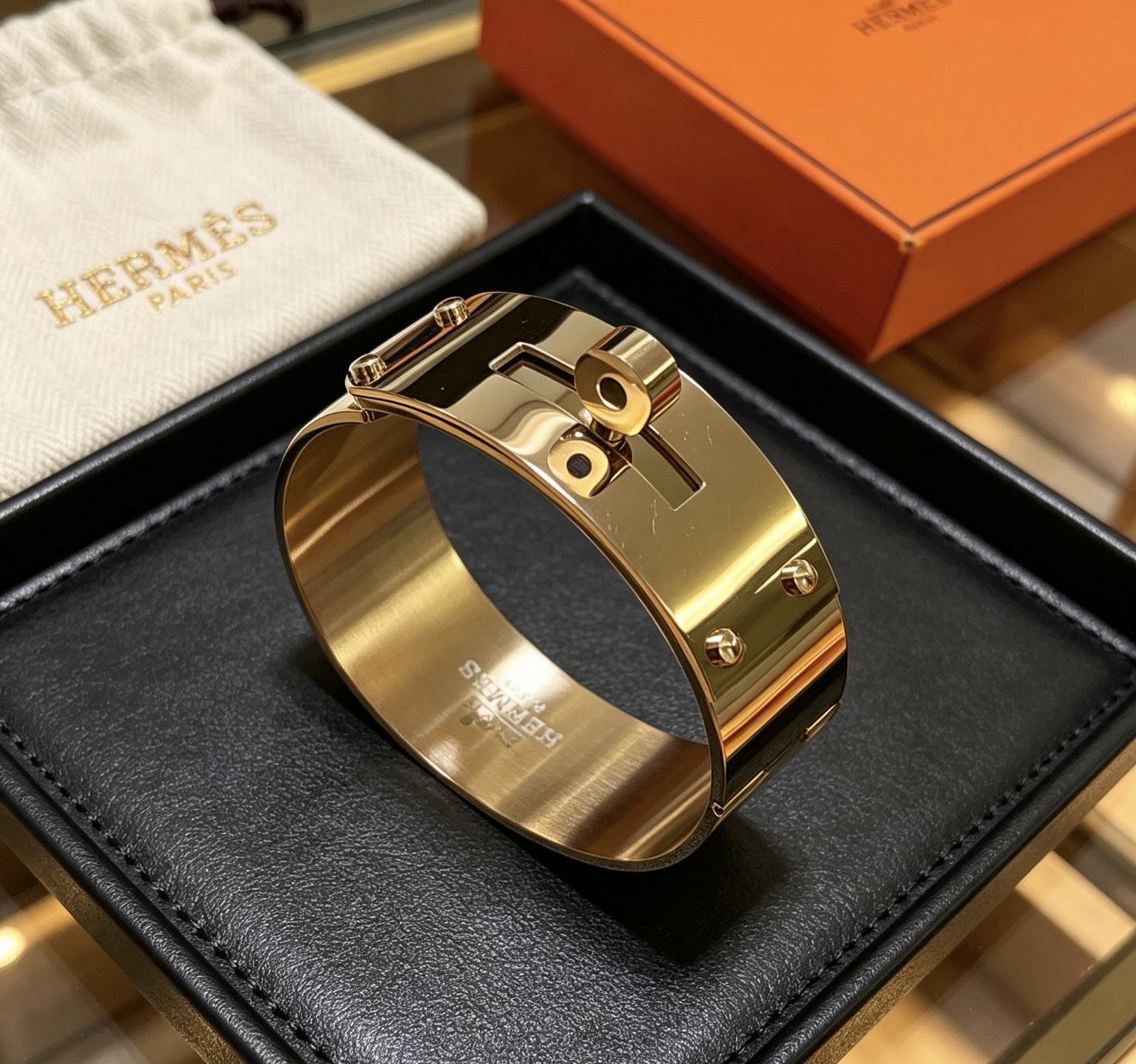 Bracciale Hermes Kelly in metallo color oro 21 mm