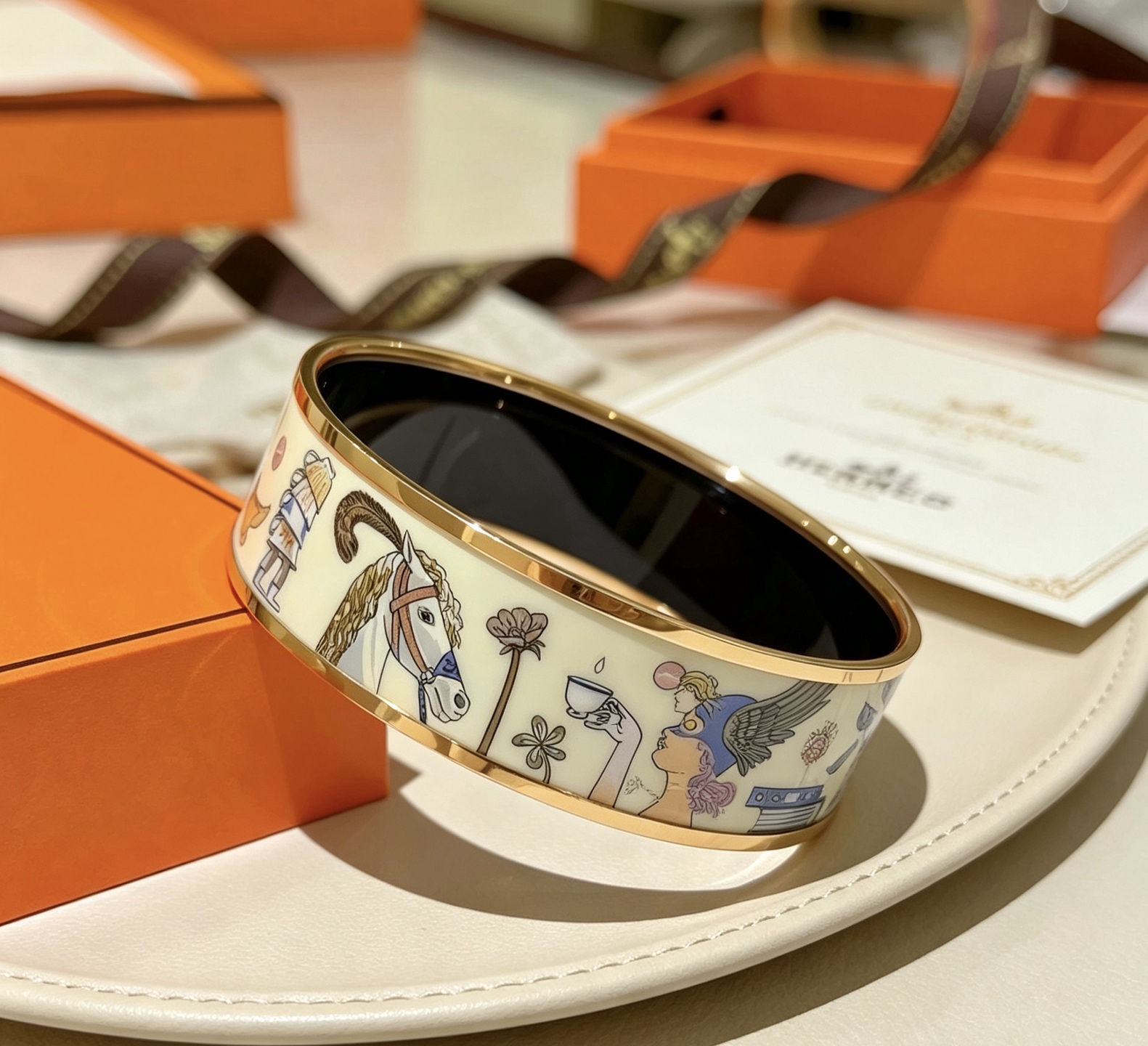 Hermes Clic Clac H Enamel Bangle bracelet Gold plated metal cream enamel with multicolor whimsical print black enamel interior 20mm width