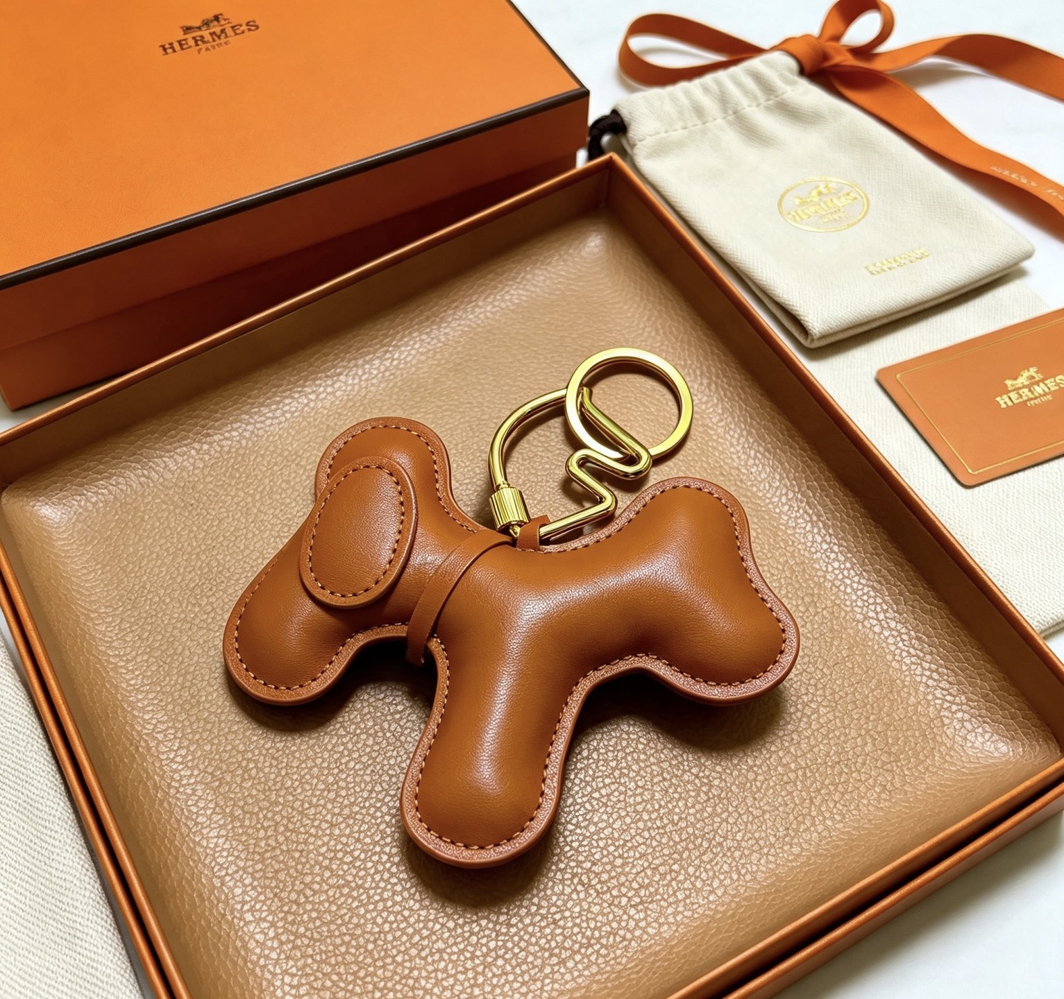 Hermes Buddy Dog Leather Charm pendant gold tone metal tan smooth leather 3cm key ring diameter charm length 8cm