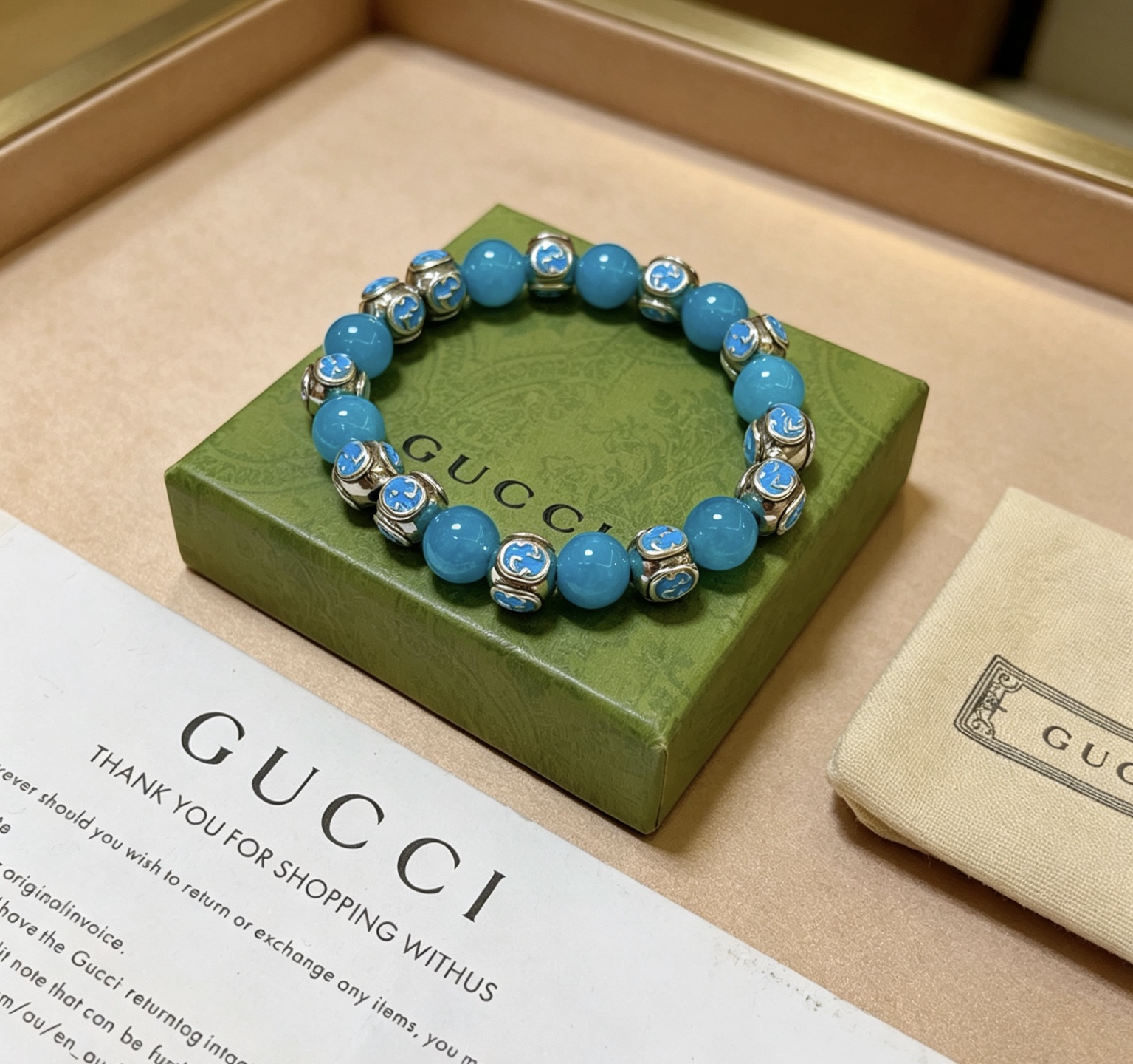 Gucci Anger Forest bracelet Silver-toned metal with bright blue beaded stones and blue enamel Interlocking G accents 18cm