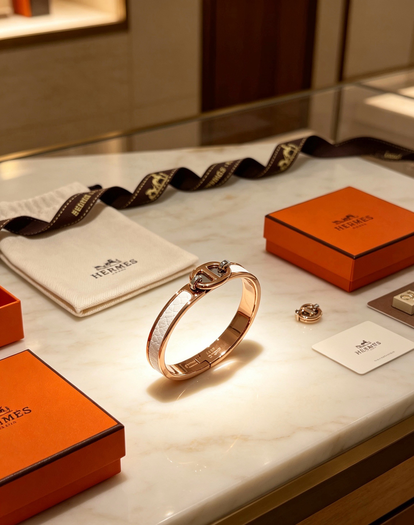 Hermes Clic Chaine d Ancre bracelet Rose gold metal with white embossed leather inlay silver-toned hardware accents 17cm