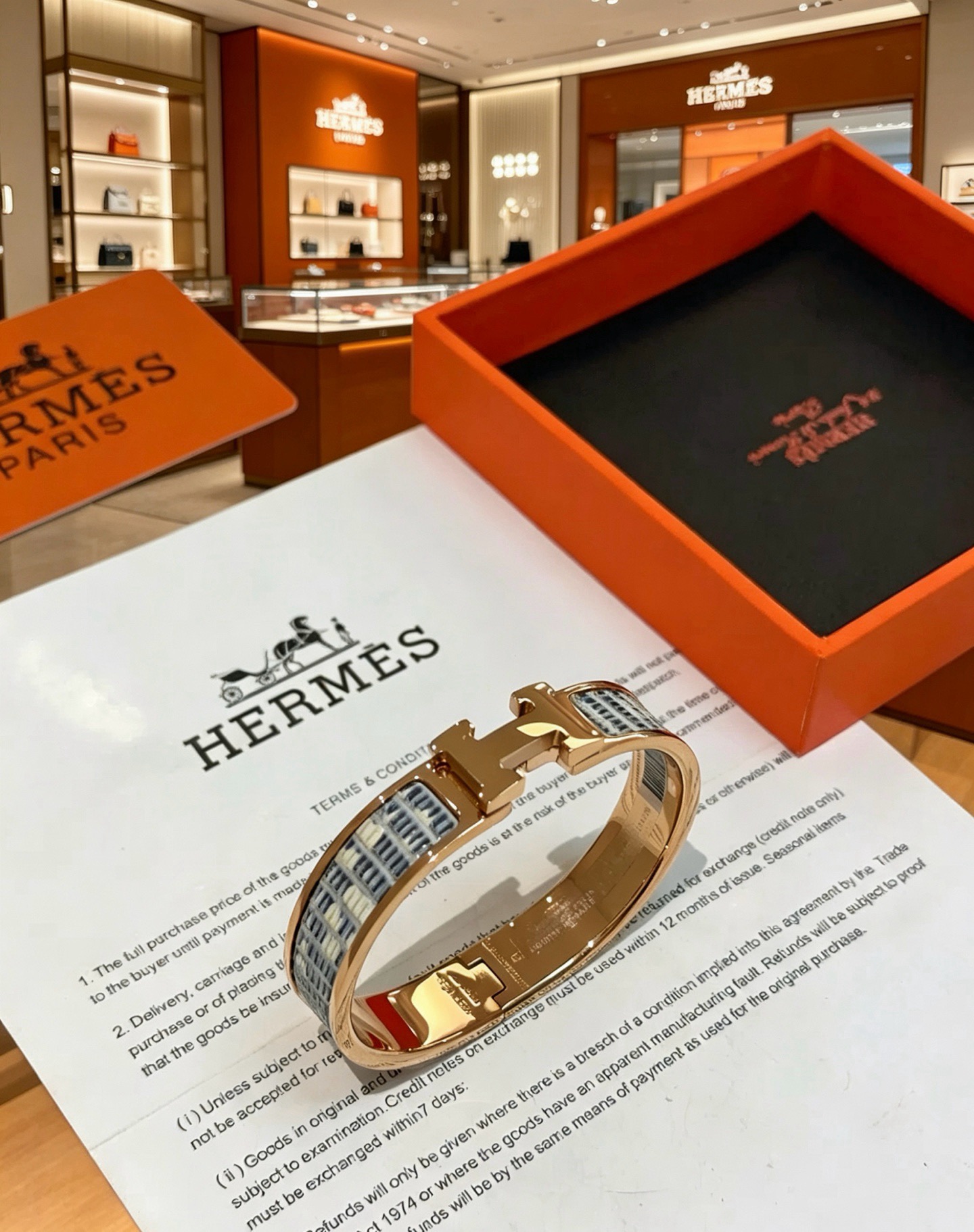 Bracelet Hermes Clic H Métal doré rose émail damier gris et blanc PM