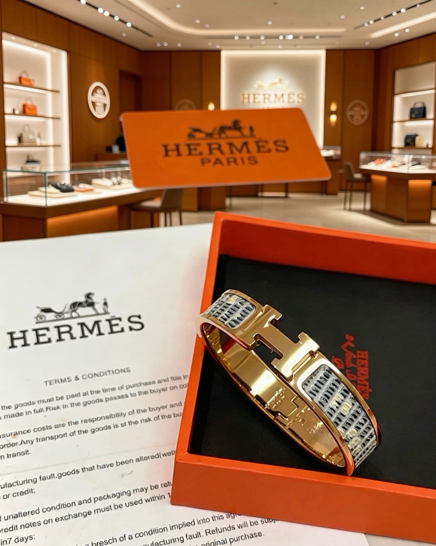 Bracelet Hermes Clic H Métal doré rose émail damier gris et blanc PM