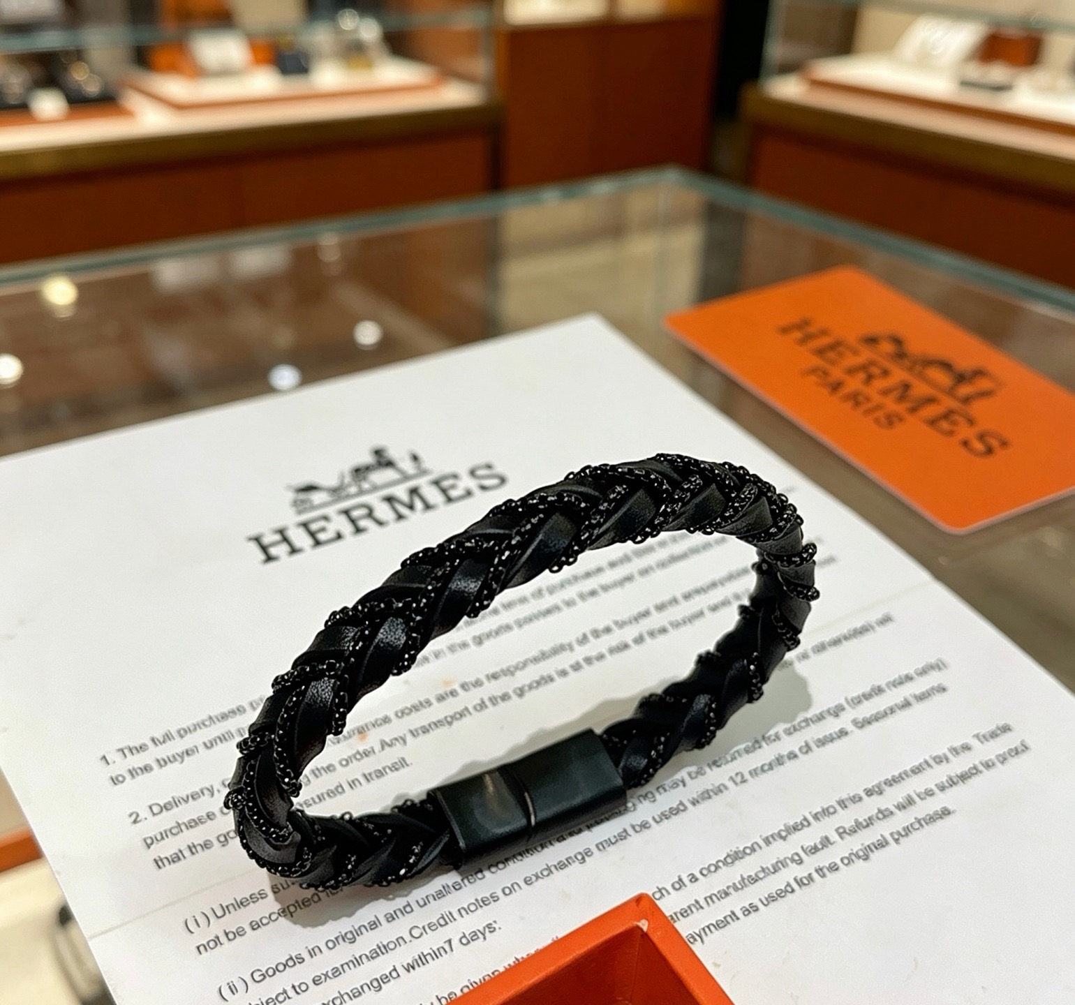 Pulseira de couro trançado Hermes Goliath Couro preto com ferragens de metal preto fosco e detalhes de corrente preta 19 cm