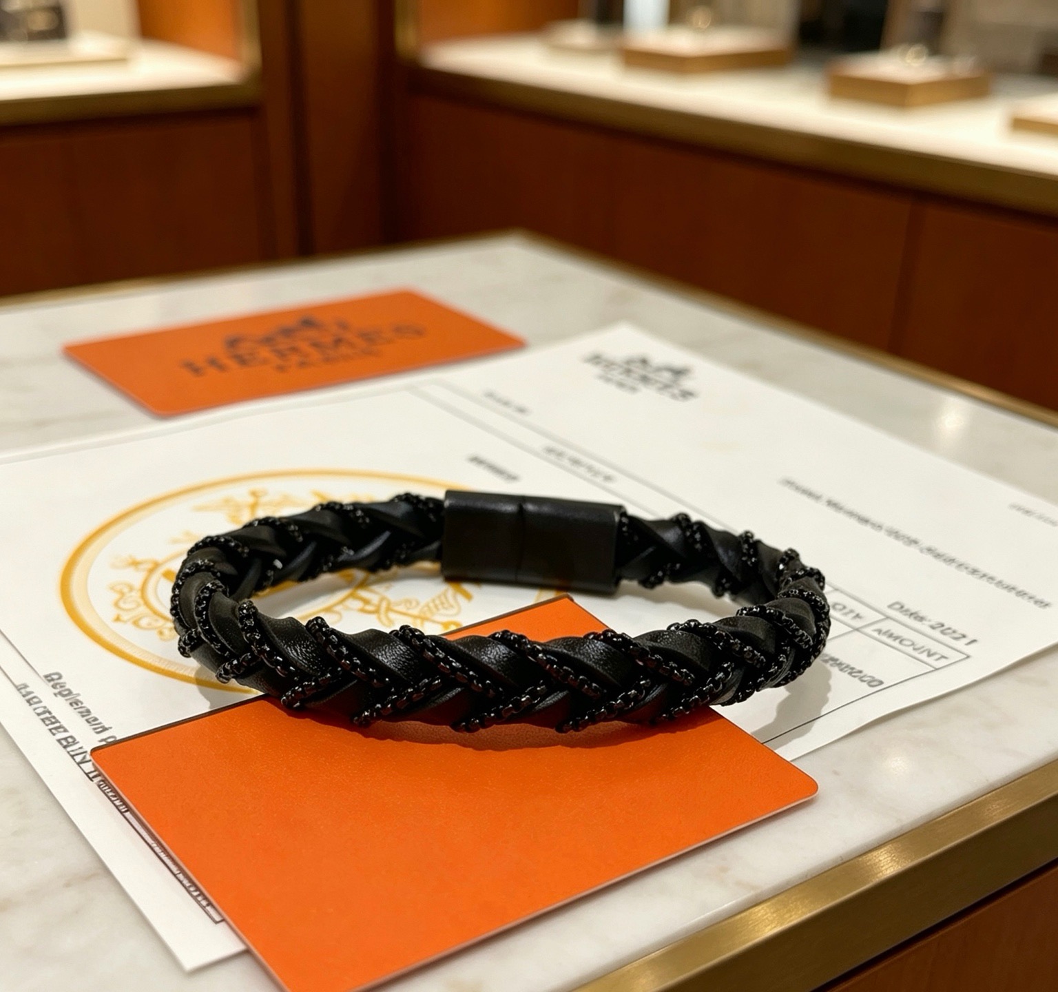 Pulseira de couro trançado Hermes Goliath Couro preto com ferragens de metal preto fosco e detalhes de corrente preta 19 cm