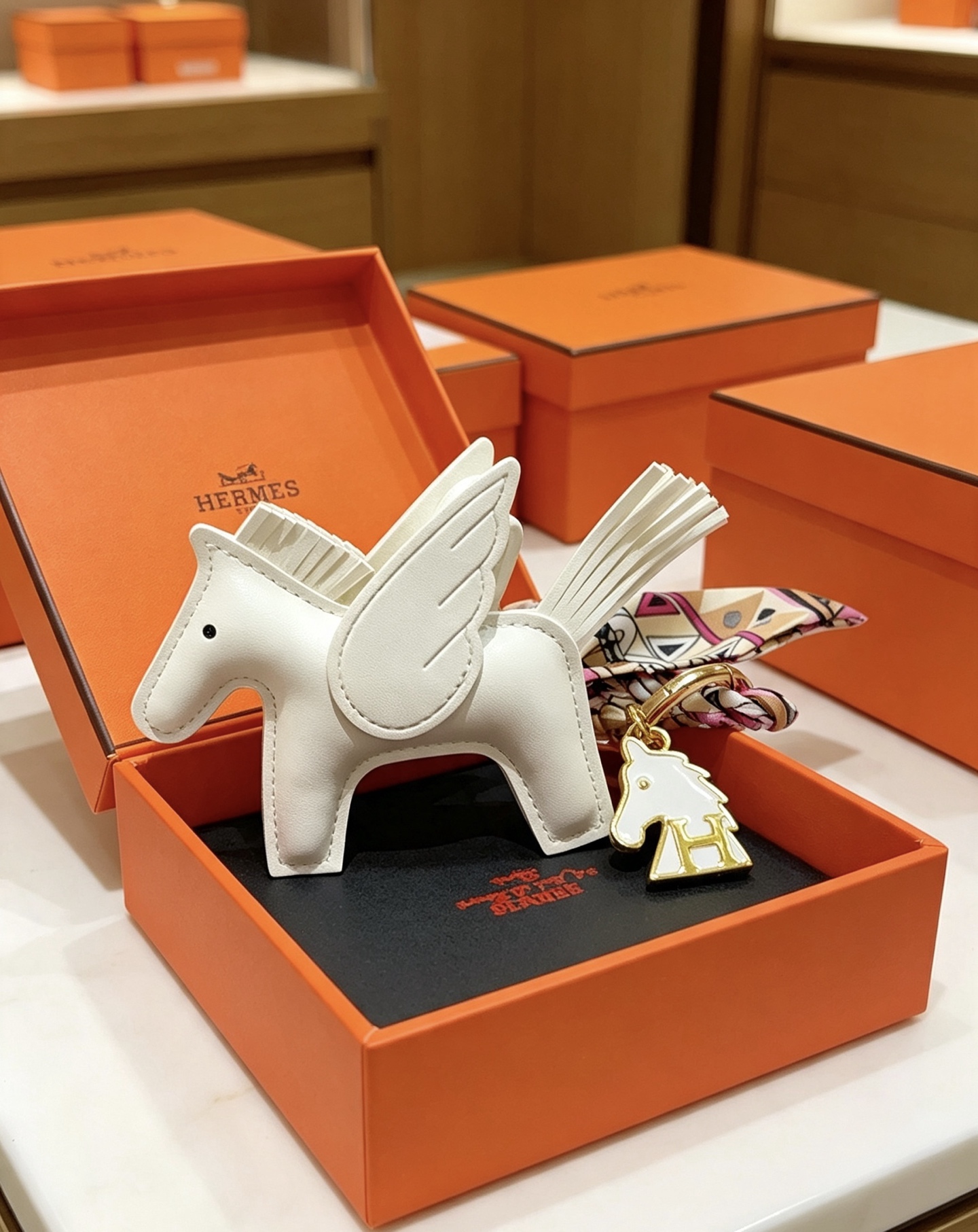 Hermes Rodeo Pegase Key Charm pendant White leather with gold tone metal multicolor printed silk twilly 12cm