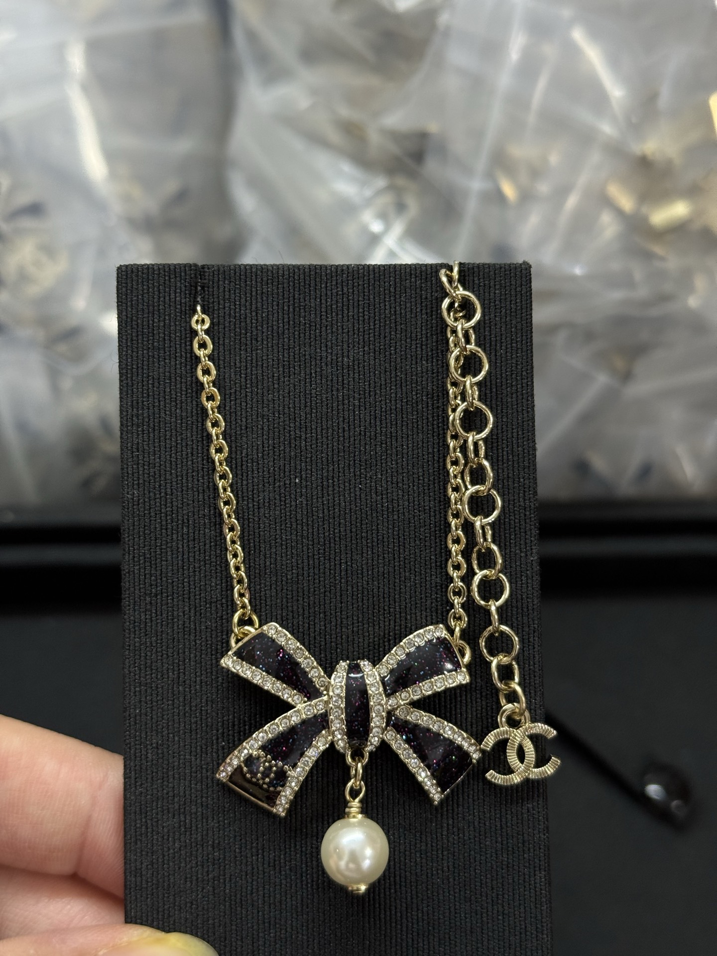 CHANEL Bow Pearl Pendant Necklace