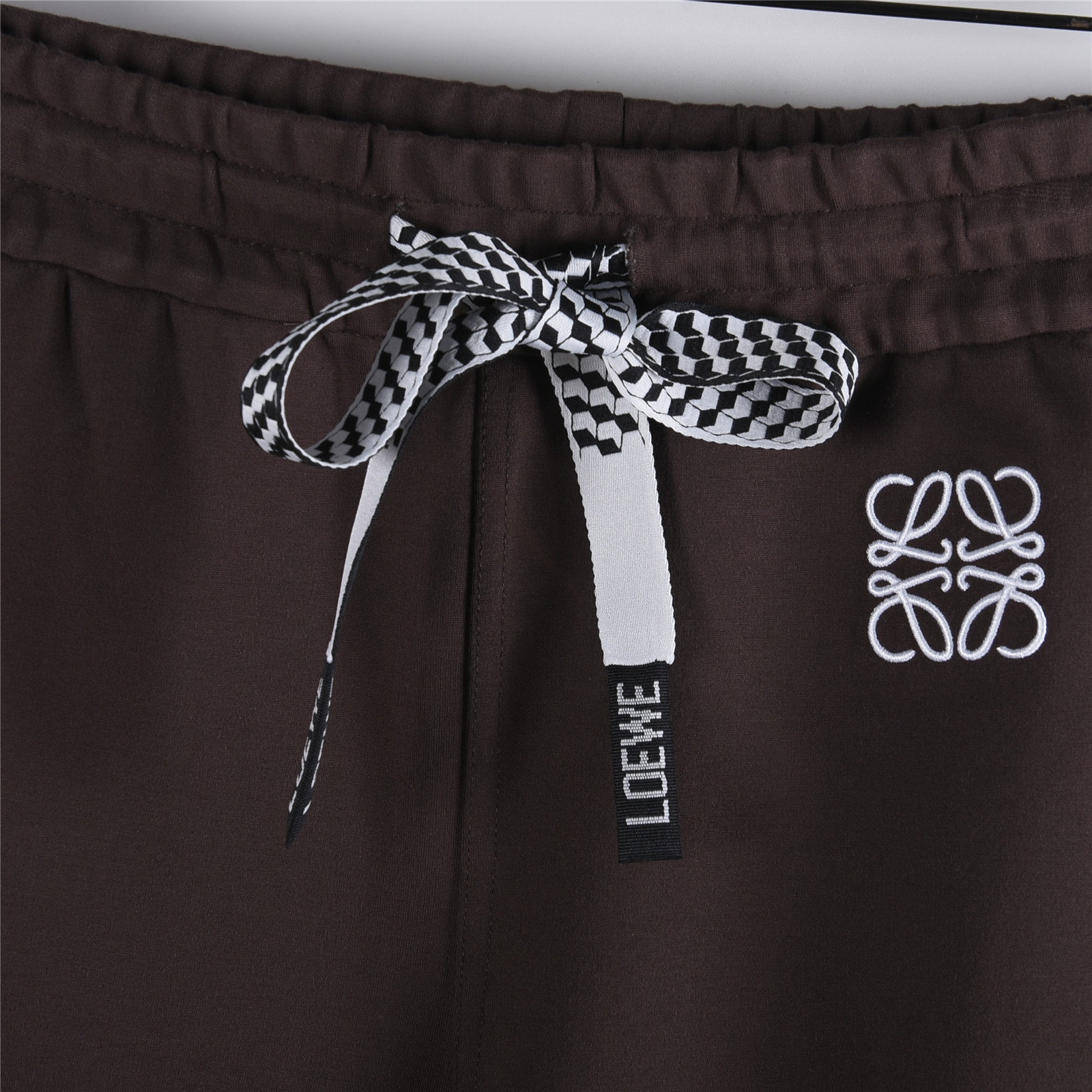 Loewe/罗意威 25Fw 拼色织带徽标刺绣套装长裤 裤腿白色织带装饰 棕色