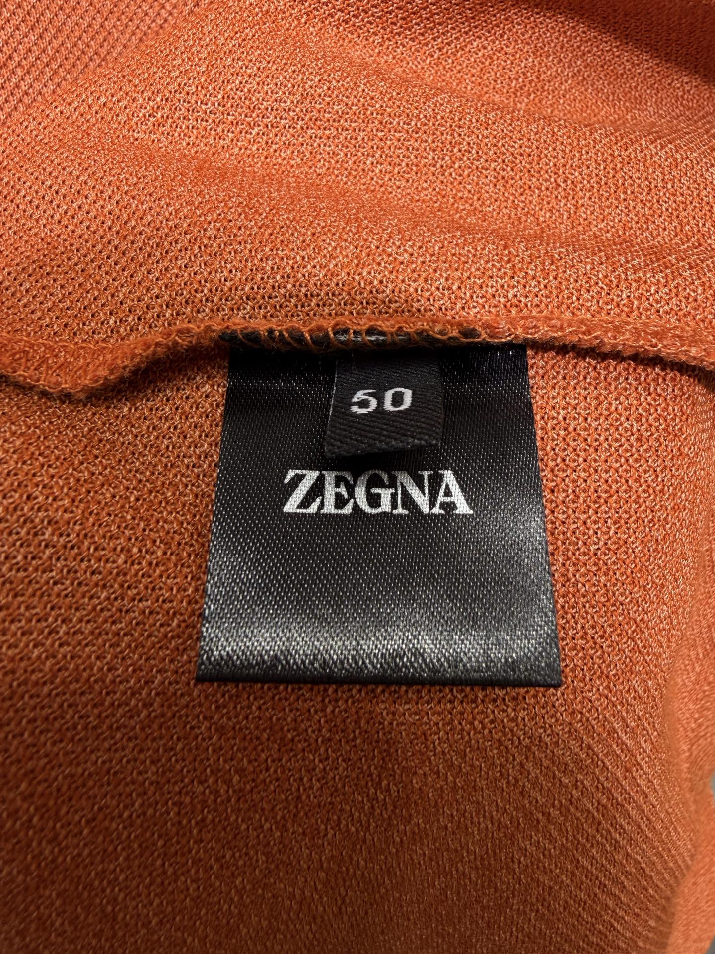 ZEGNA 杰尼亚2026新款男士标识短袖Polo衫，商务休闲翻领POLO恤.该款Polo衫采用丝光珠地