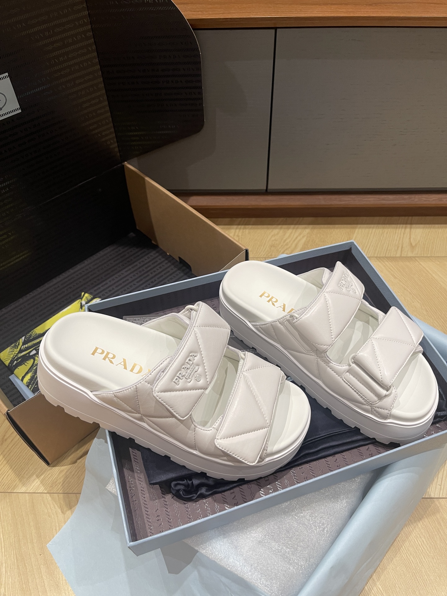 Шлепанцы на толстой подошве Prada