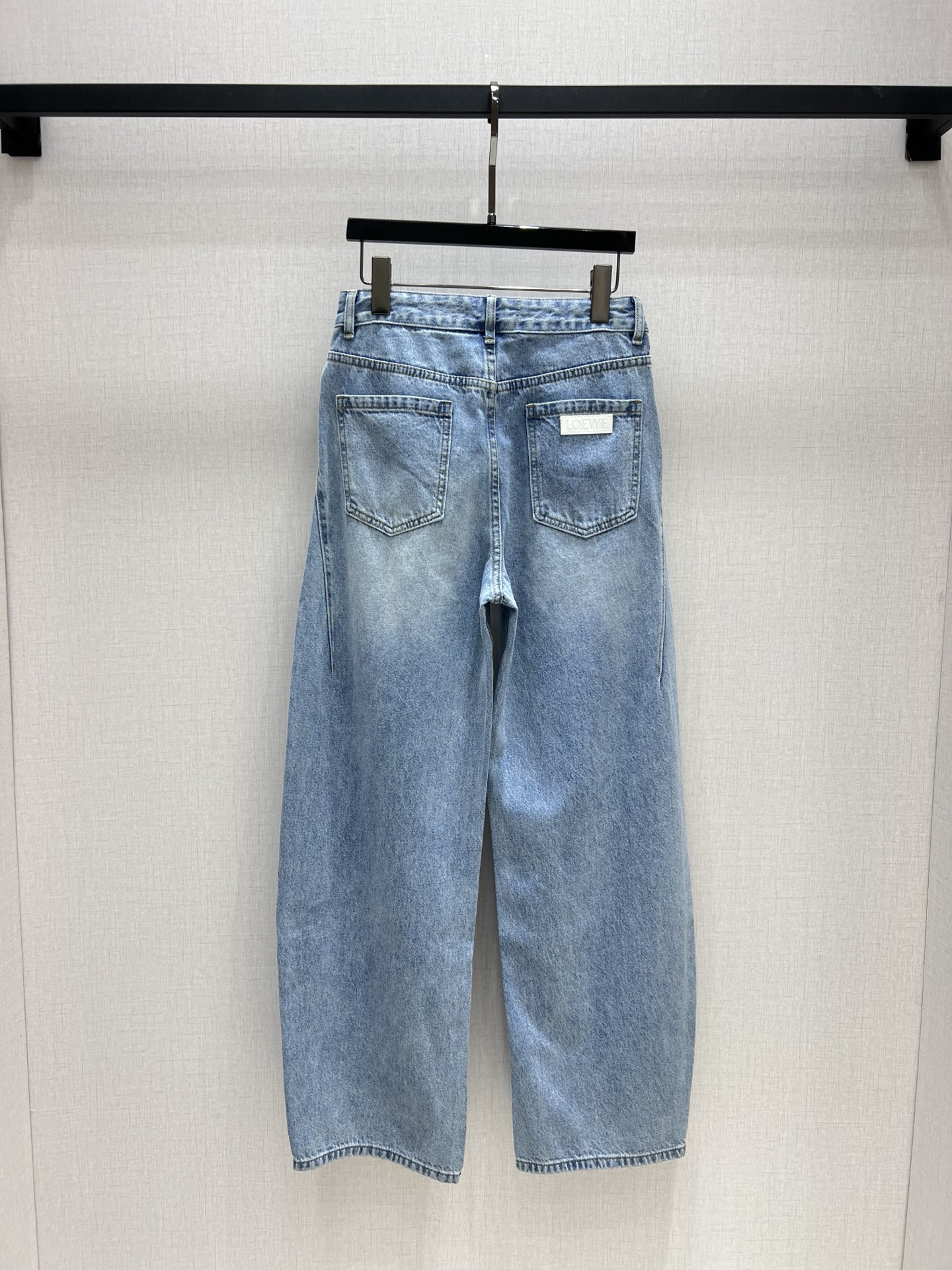 Loewe Women's High-Waisted Wide-Leg Jeans with Embossed Logo Pocket 8 i1744719362911 2134 1 0