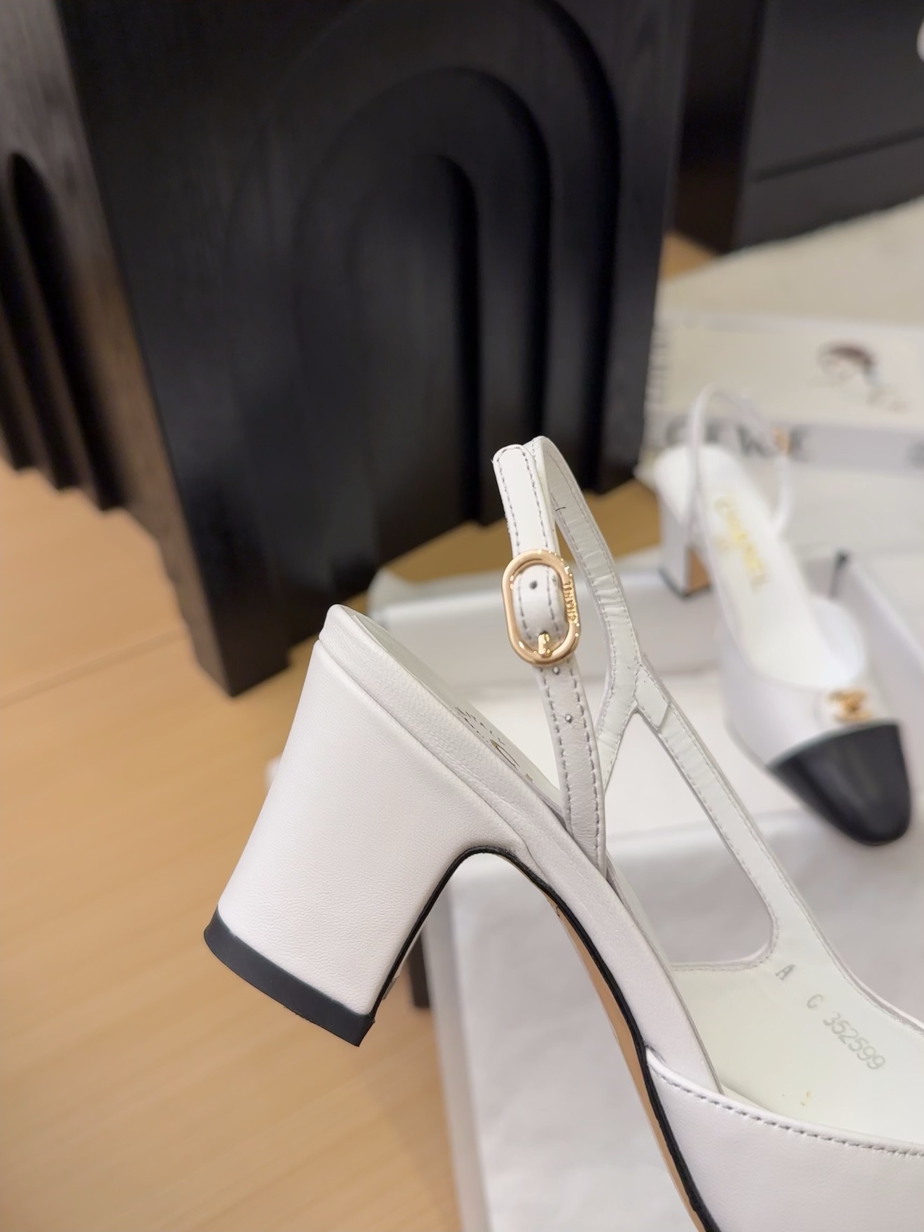 Elegant Chanel 25 Slingback Heels - Black and White Leather Pumps 6 i1743328853 38 0