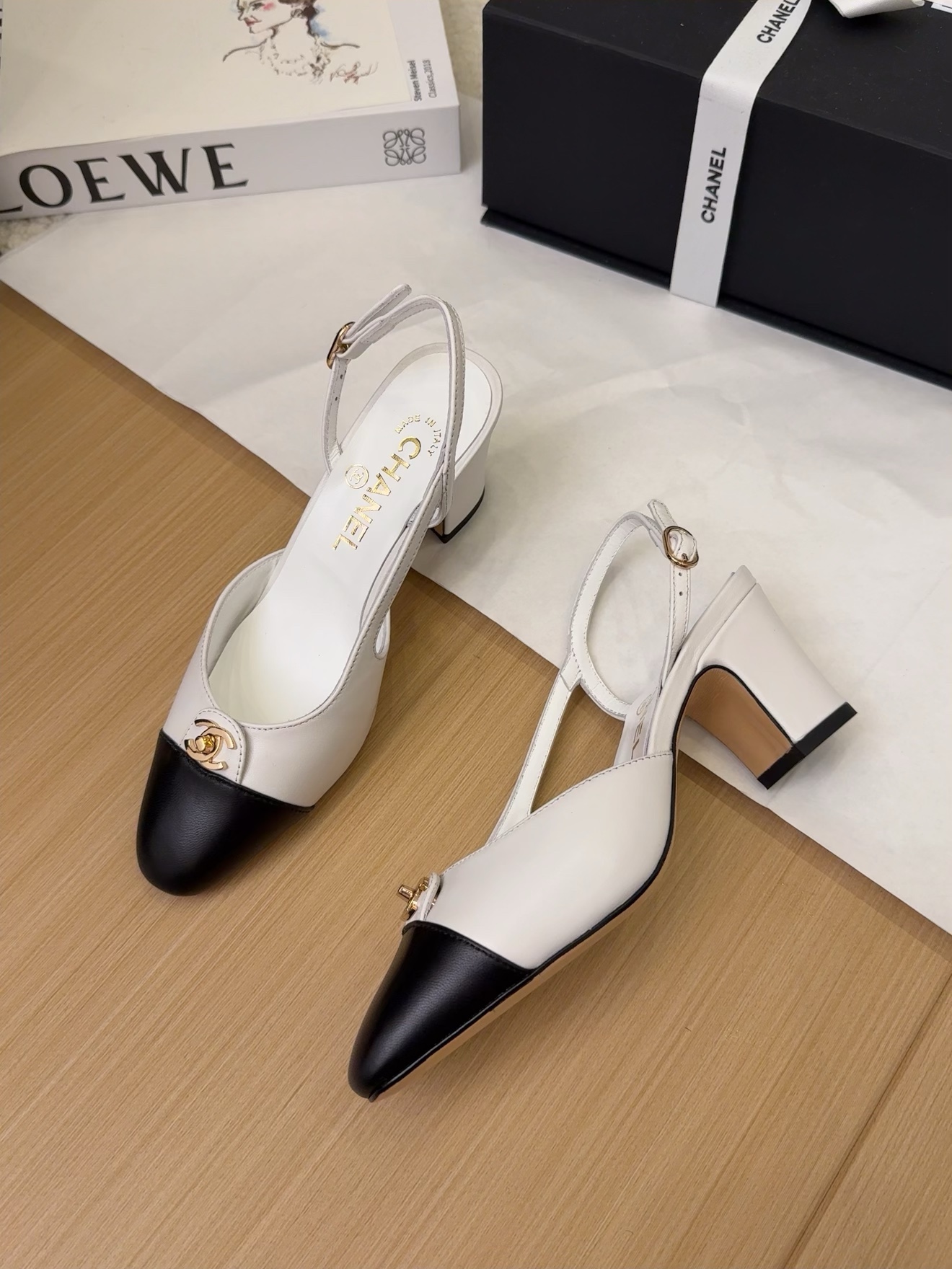 Elegant Chanel 25 Slingback Heels - Black and White Leather Pumps 2 i1743328853 6589 0