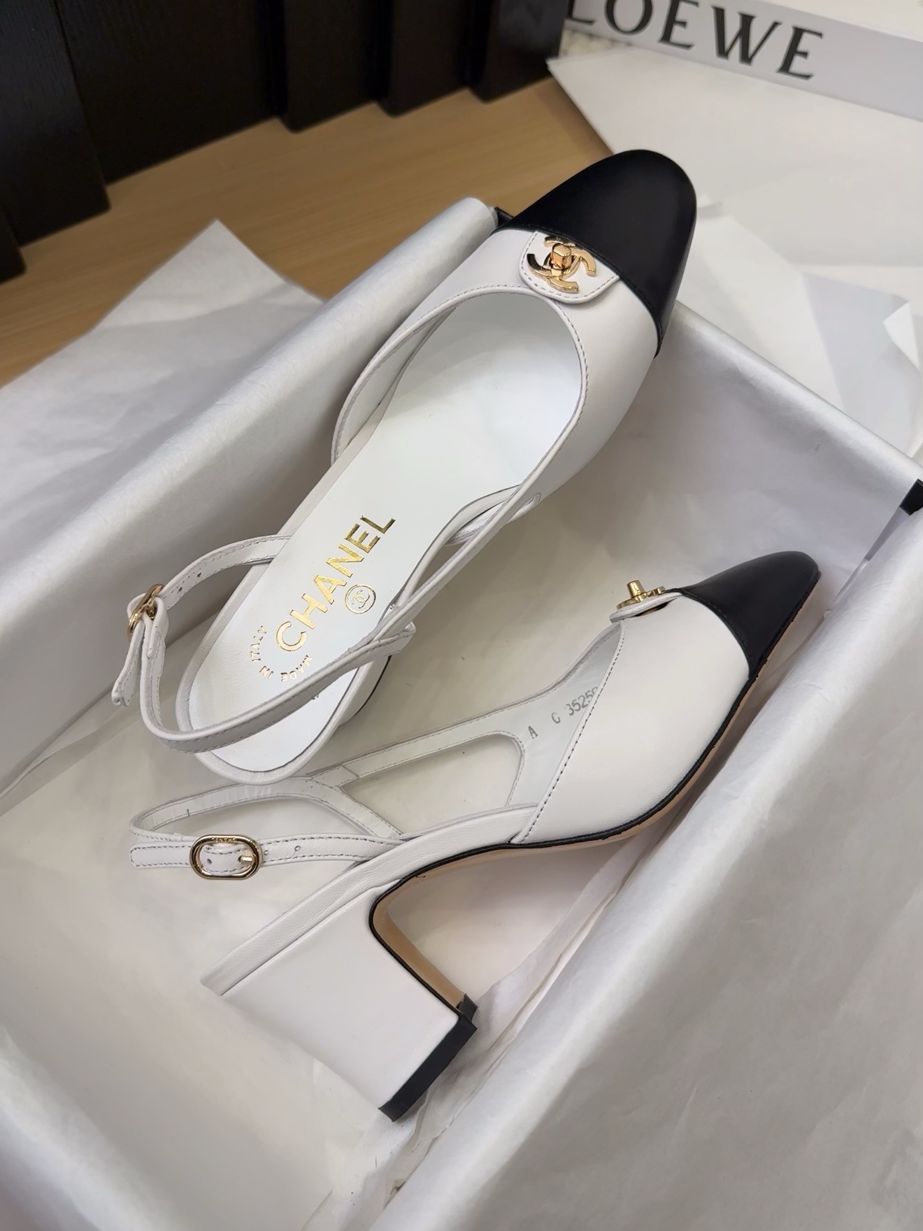 Elegant Chanel 25 Slingback Heels - Black and White Leather Pumps 10 i1743328853 8786 0