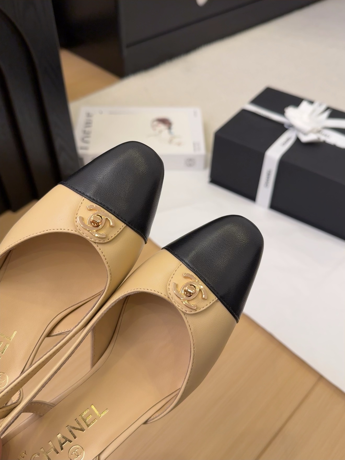 Elegant Chanel Slingback Pumps: Beige & Black Leather, Authentic Italian Packaging 6 i1743328986 1025 5
