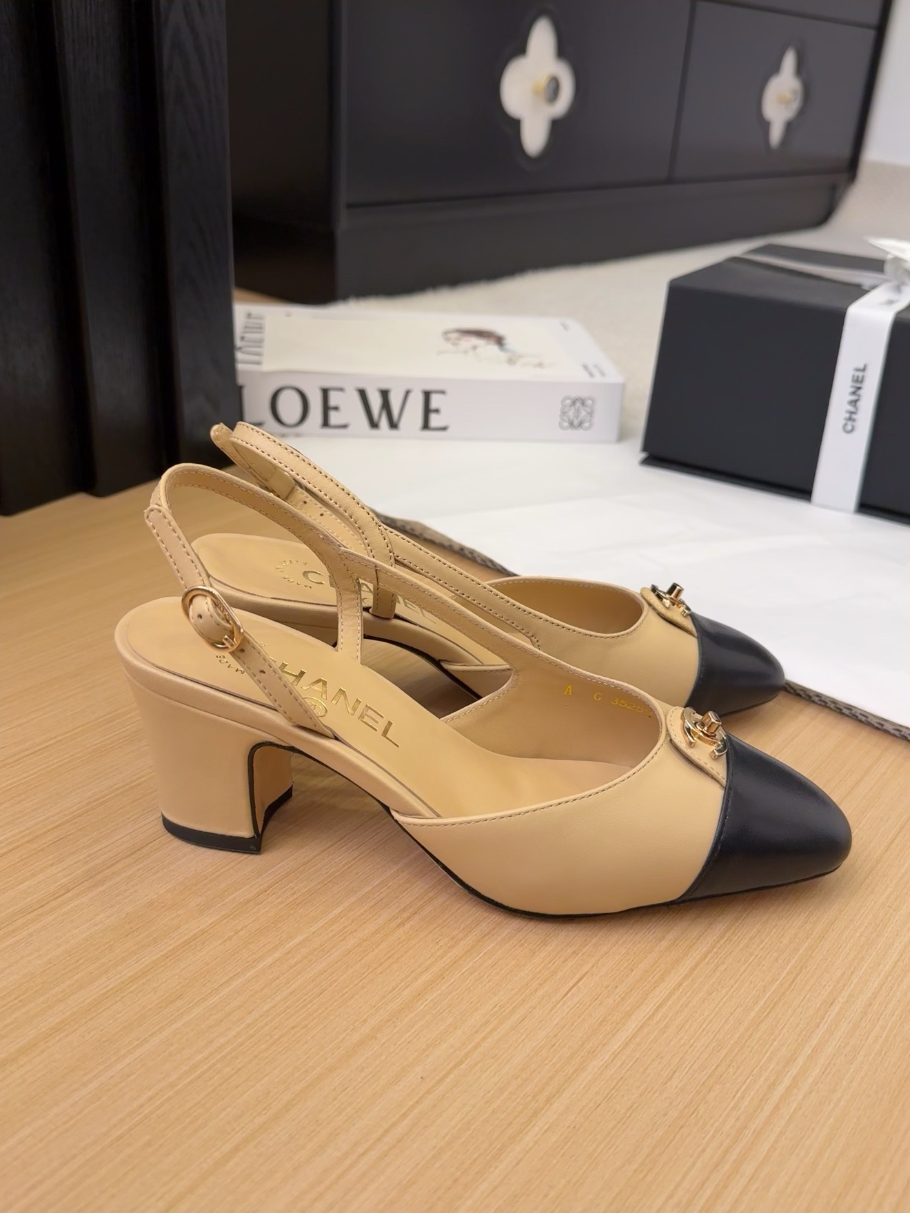Elegant Chanel Slingback Pumps: Beige & Black Leather, Authentic Italian Packaging 4 i1743328986 7420 1