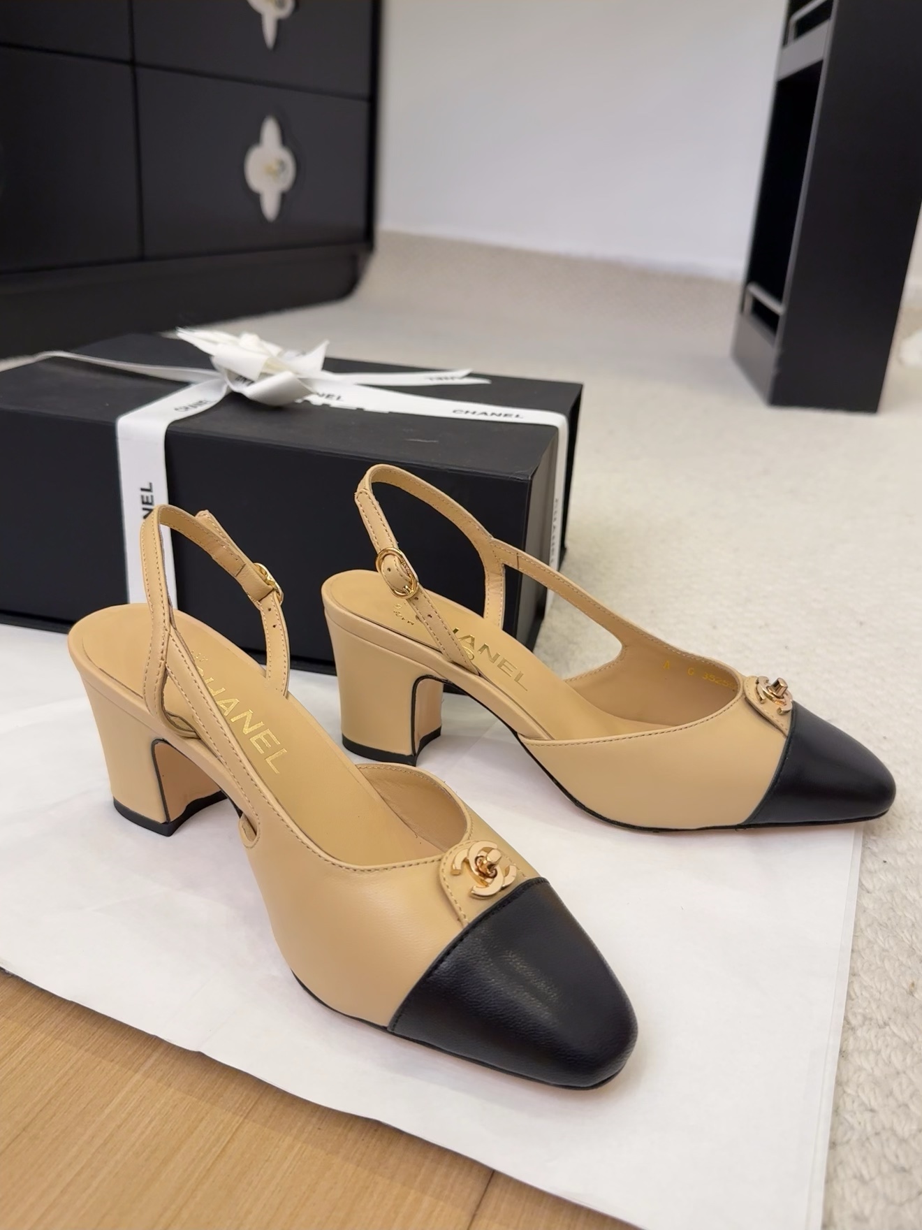 Elegant Chanel Slingback Pumps: Beige & Black Leather, Authentic Italian Packaging 5 i1743328986 9588 3