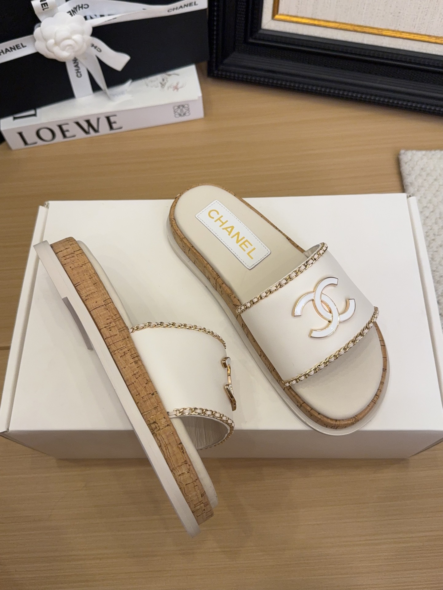 Elegant Chanel Women's White Leather Slides with CC Logo & Chain Detail 10 i1744209384 1858 2