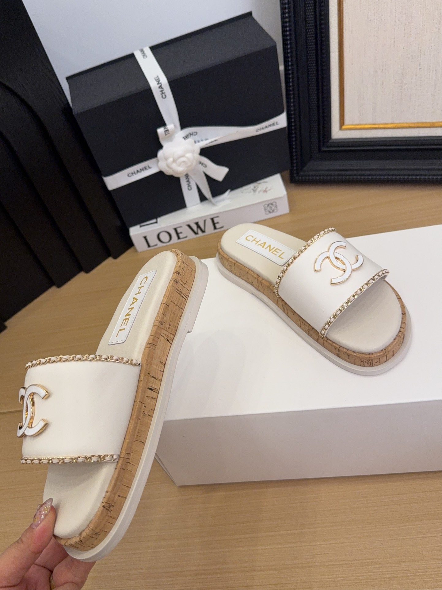 Elegant Chanel Women's White Leather Slides with CC Logo & Chain Detail 6 i1744209384 4848 7