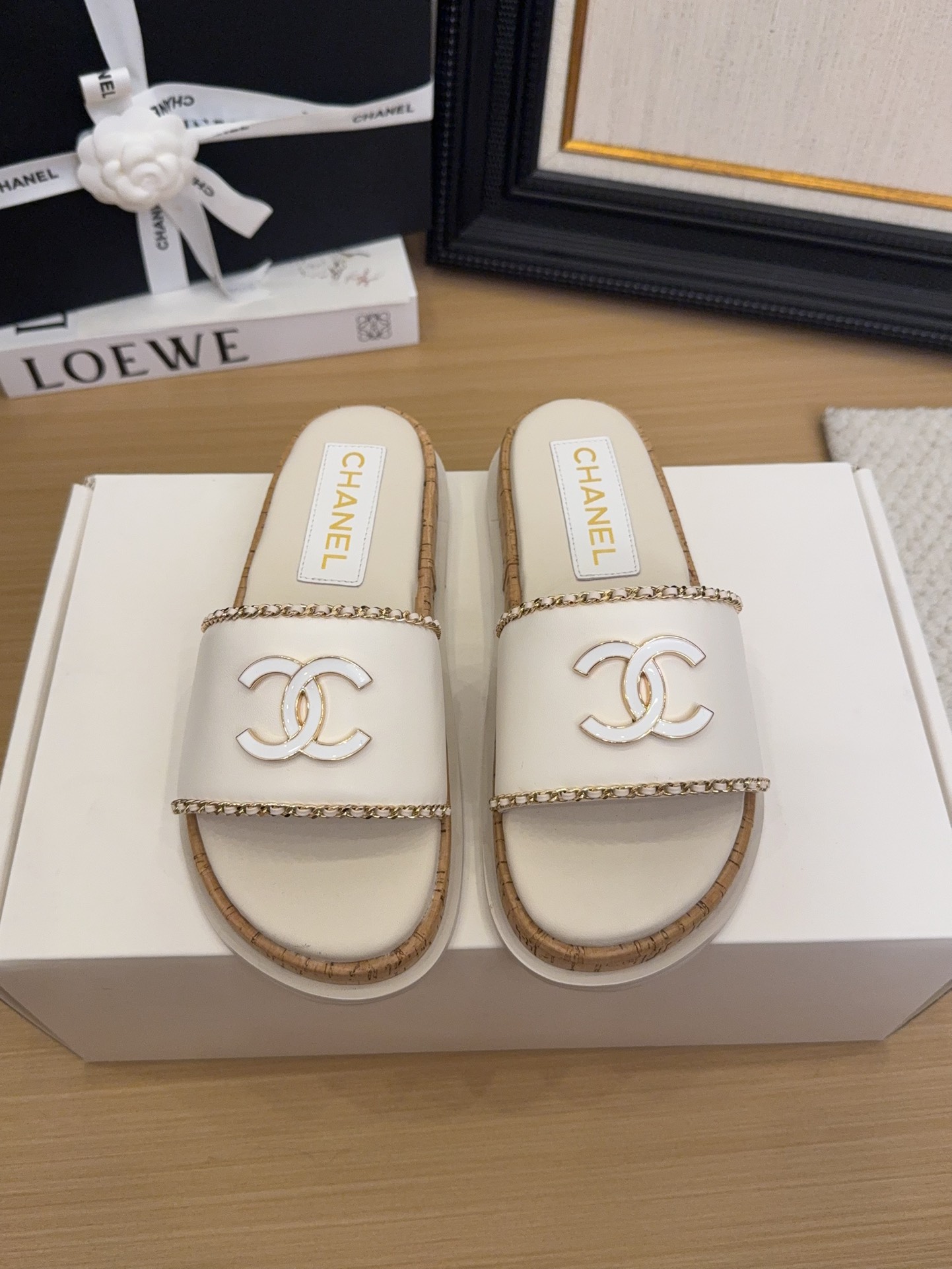 Elegant Chanel Women's White Leather Slides with CC Logo & Chain Detail 3 i1744209384 4958 3