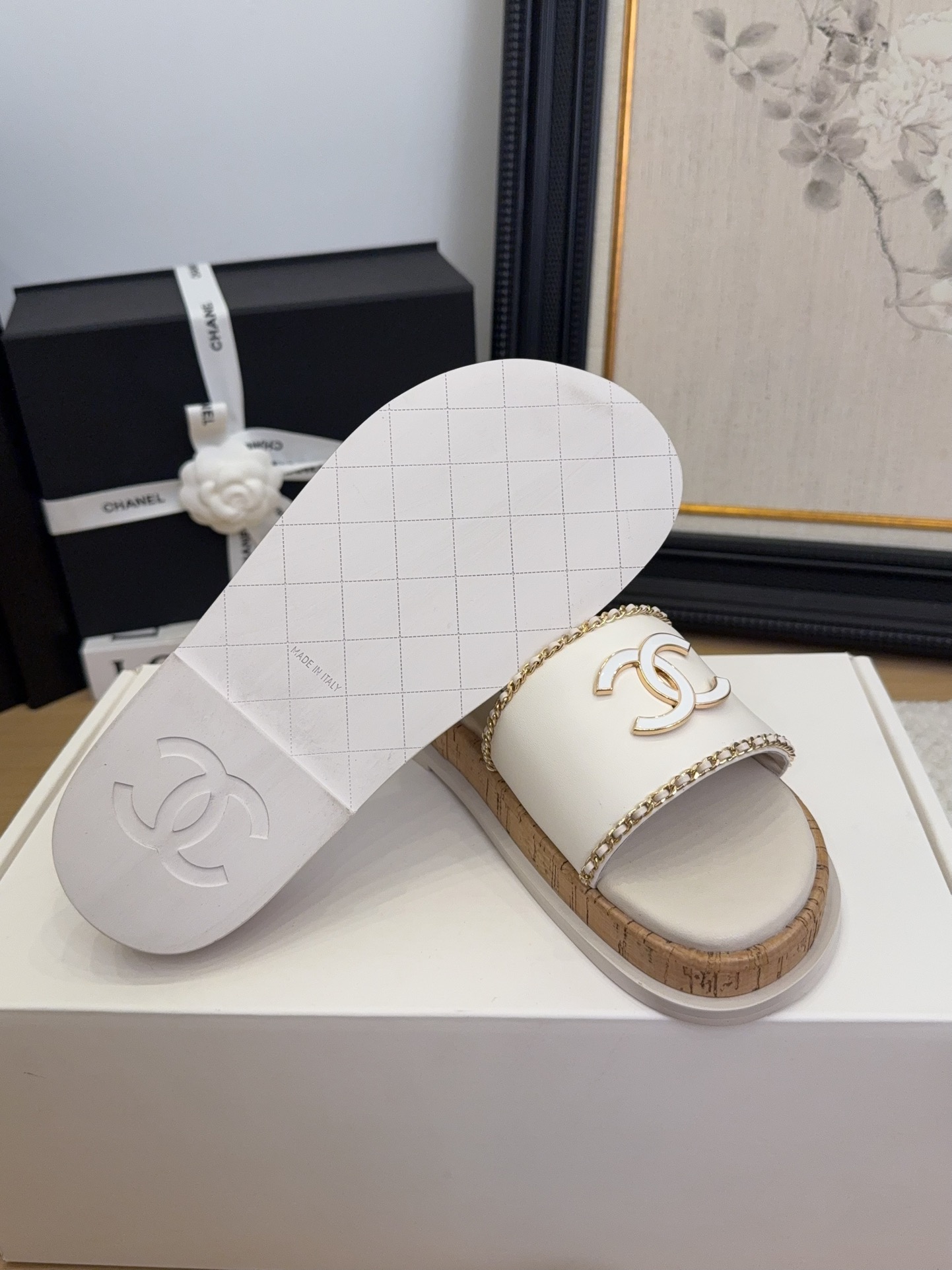 Elegant Chanel Women's White Leather Slides with CC Logo & Chain Detail 9 i1744209384 5778 4